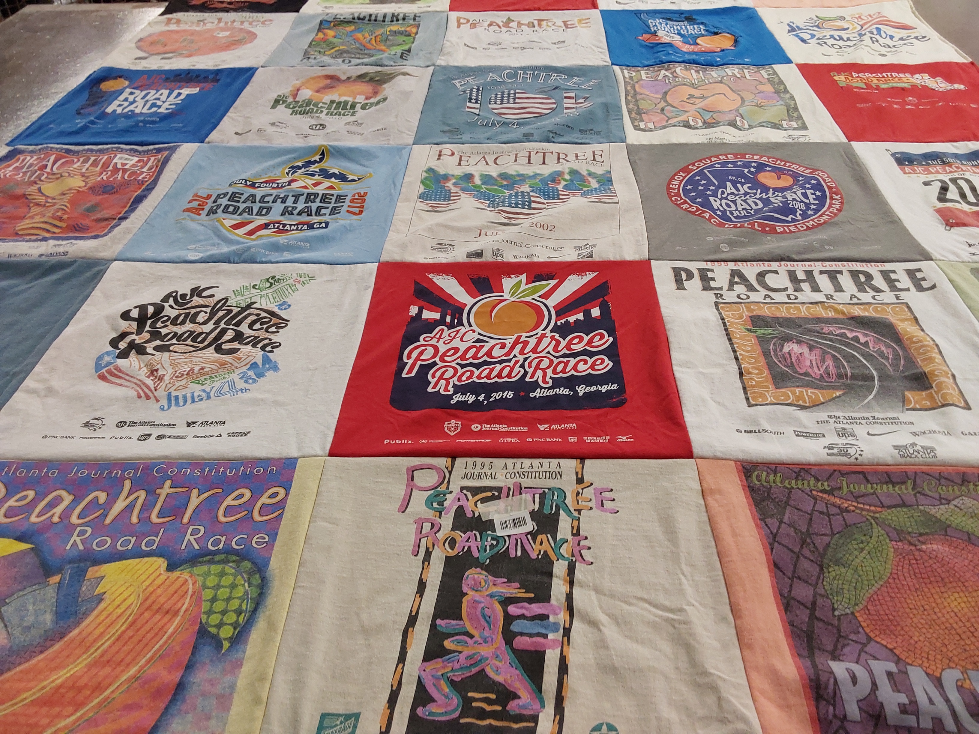 T-shirt quilt with running, fitness themes by Ken from GA