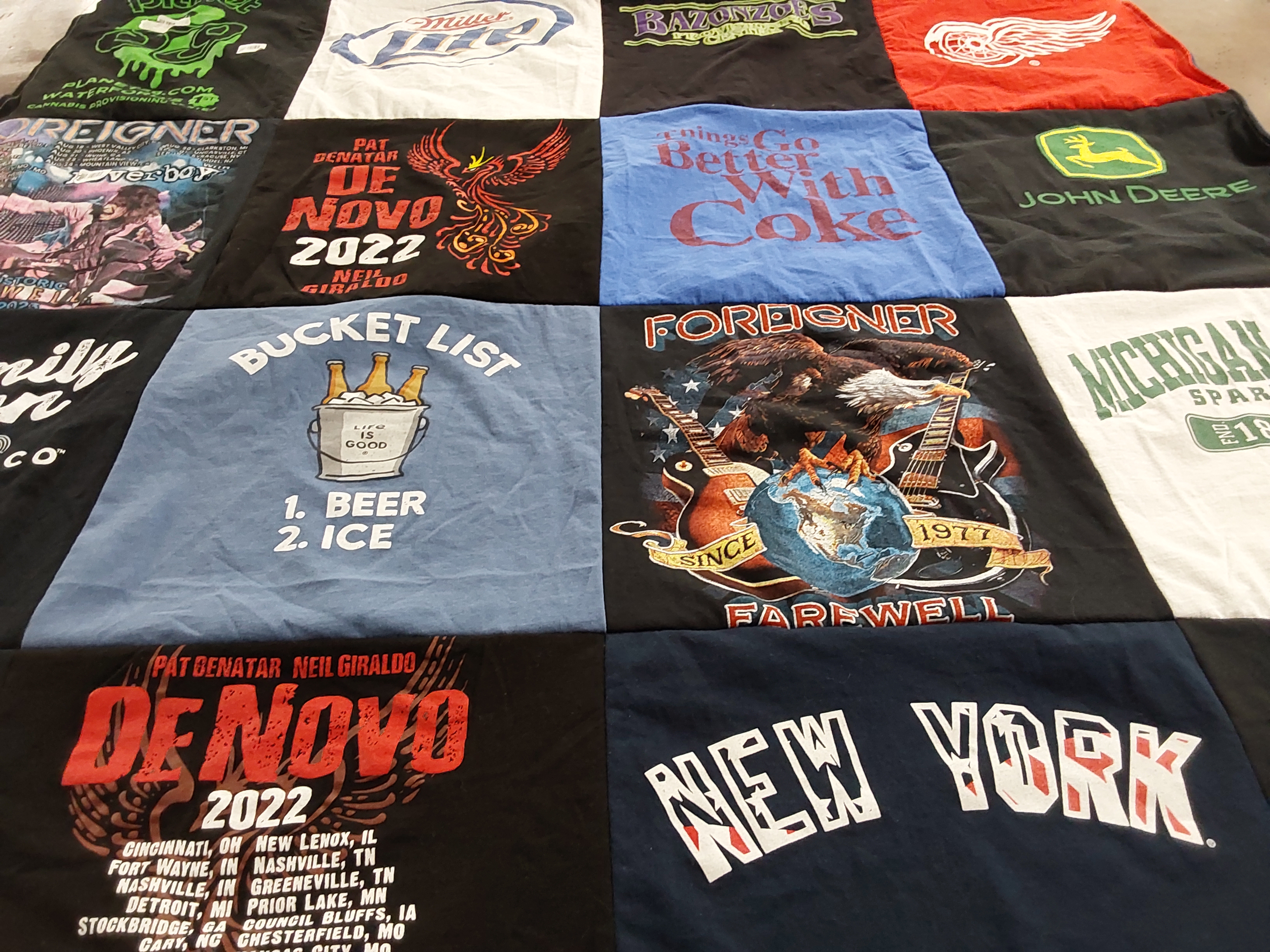 T-shirt quilt with music, travel themes by Diane from MI