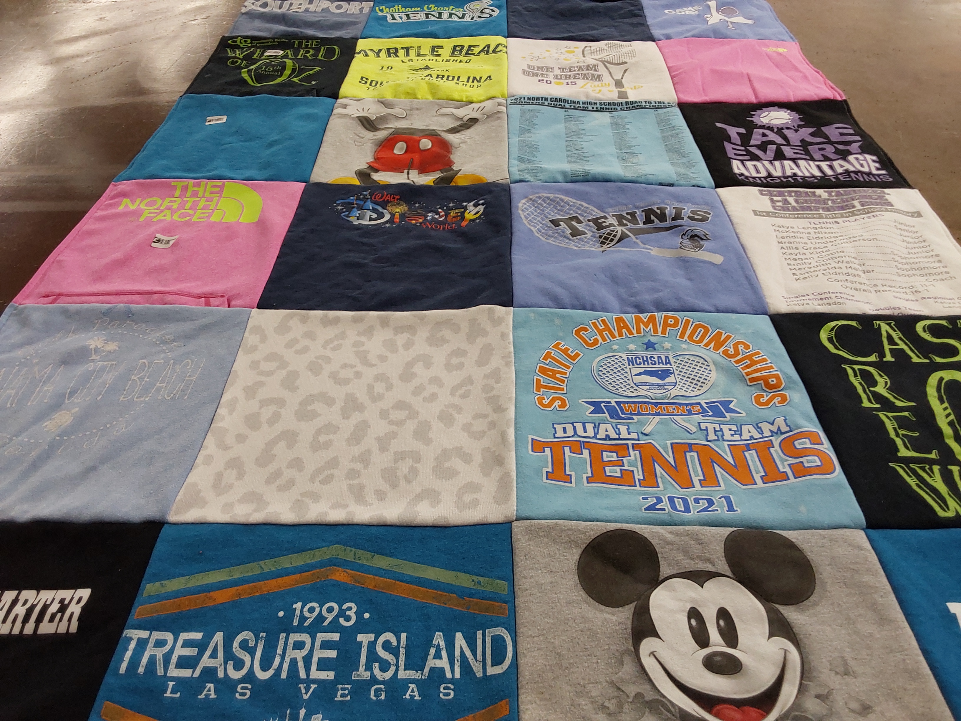 T-shirt quilt with tennis, travel themes by Sherry from NC