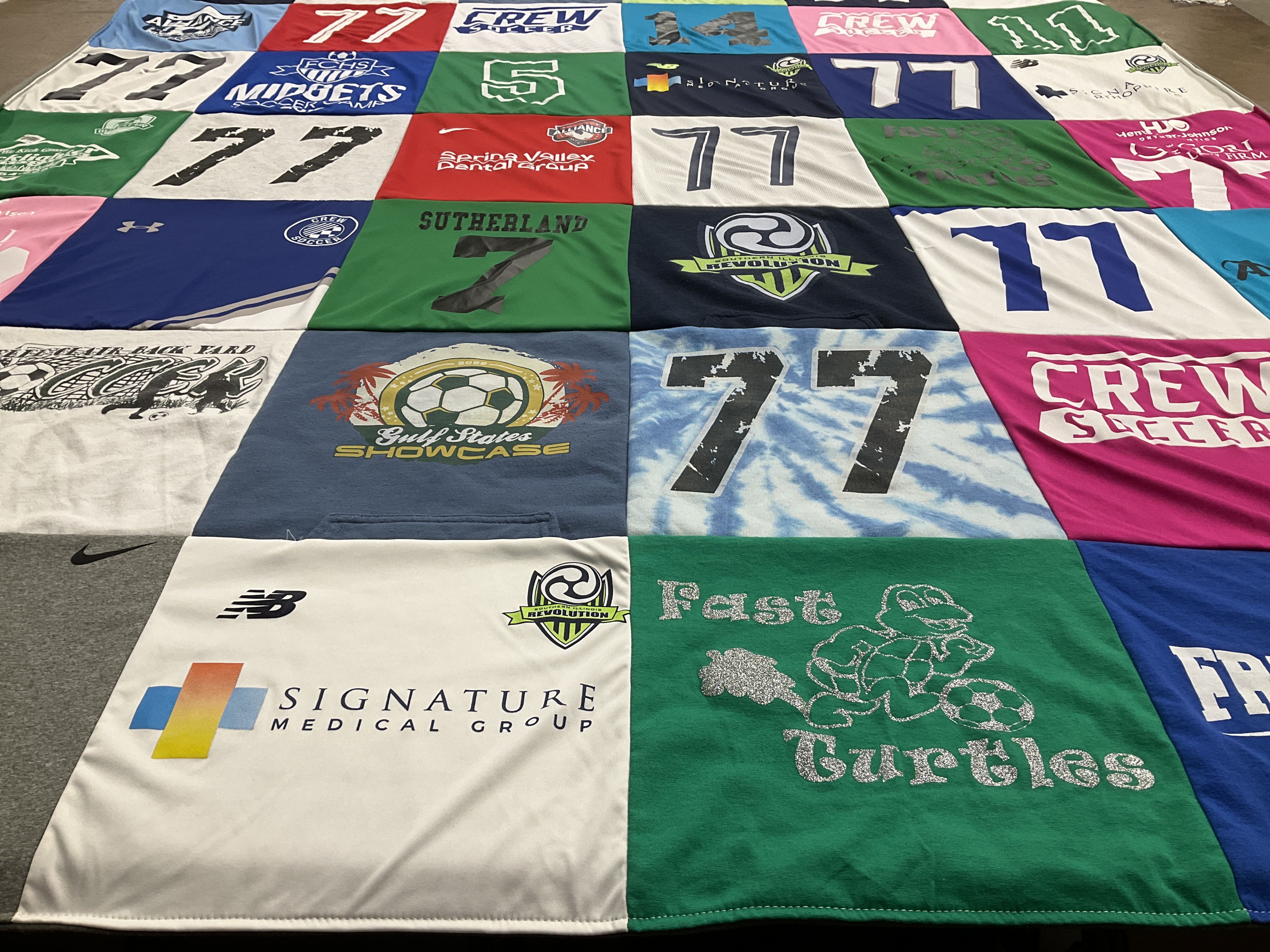 T-shirt quilt with soccer themes by Sara from IL