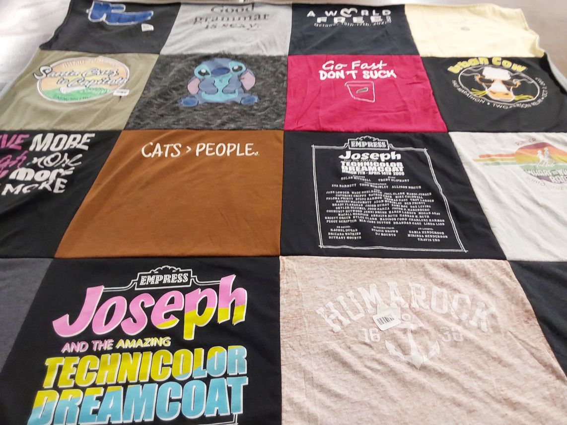 T-shirt quilt with theater, animals themes by Jenni from CA