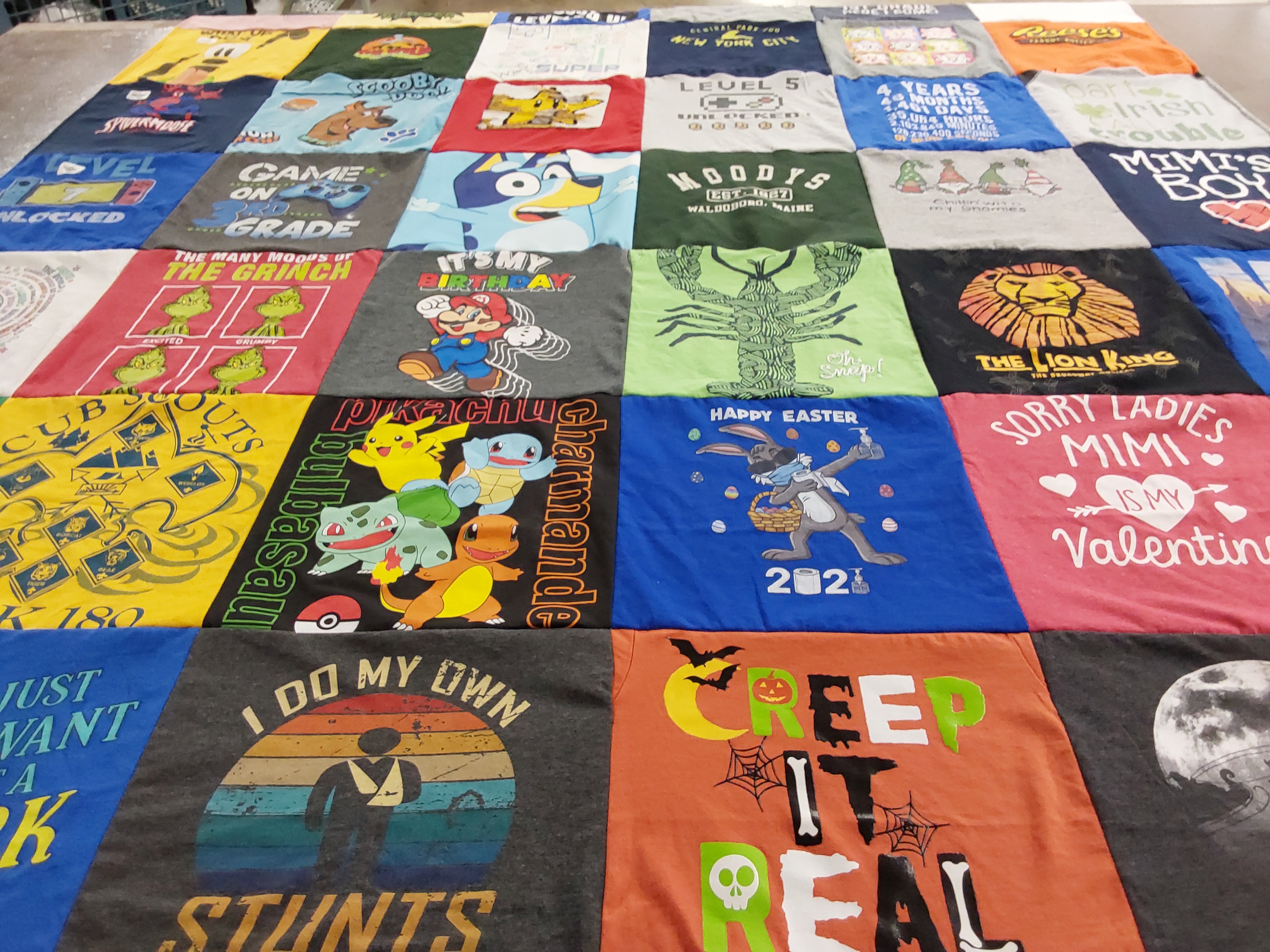 T-shirt quilt with pokemon, club scouts themes by Linda from FL