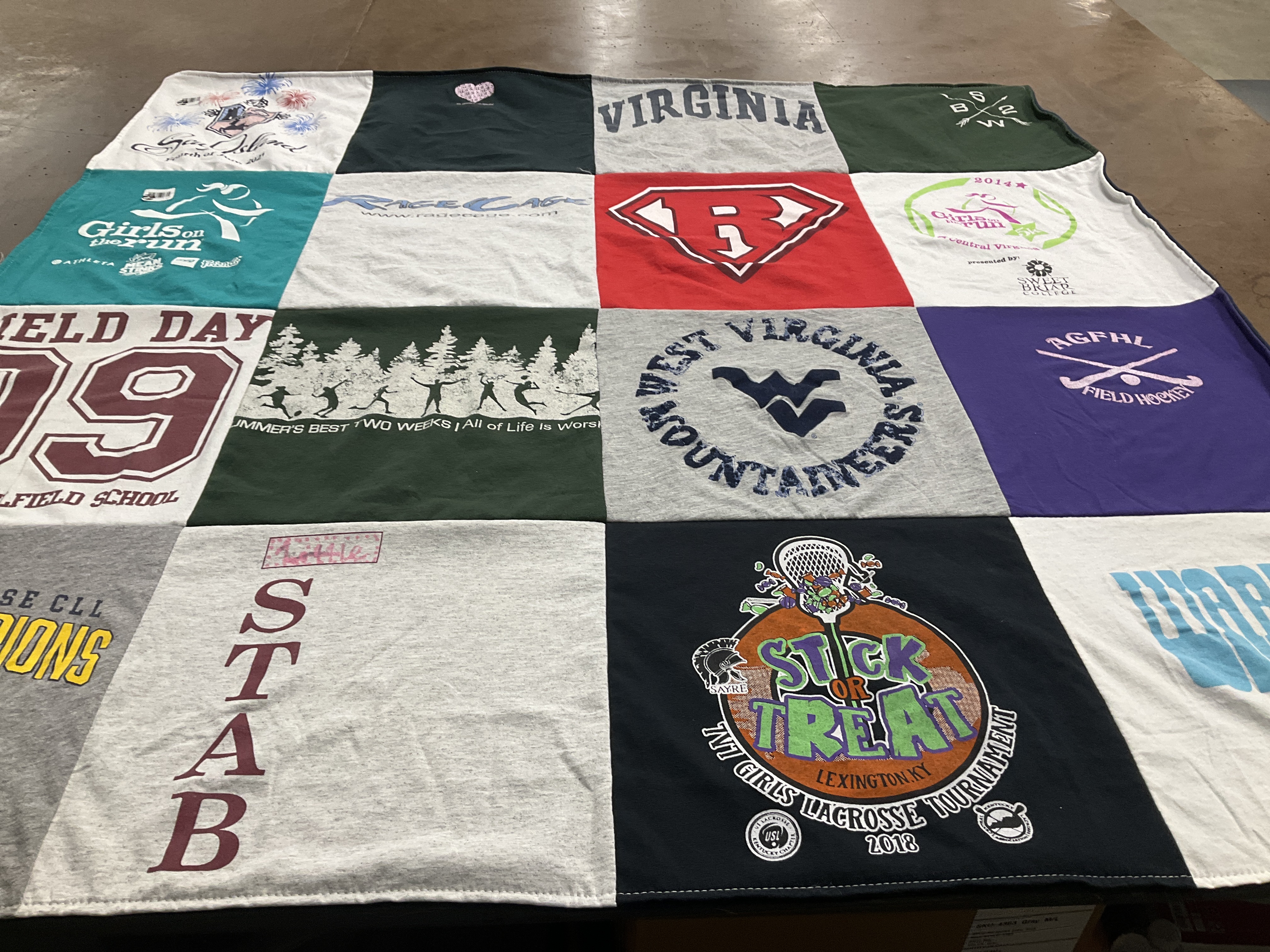 T-shirt quilt featuring west virginia mountaineers, agfhl field hockey by Lisa from WV