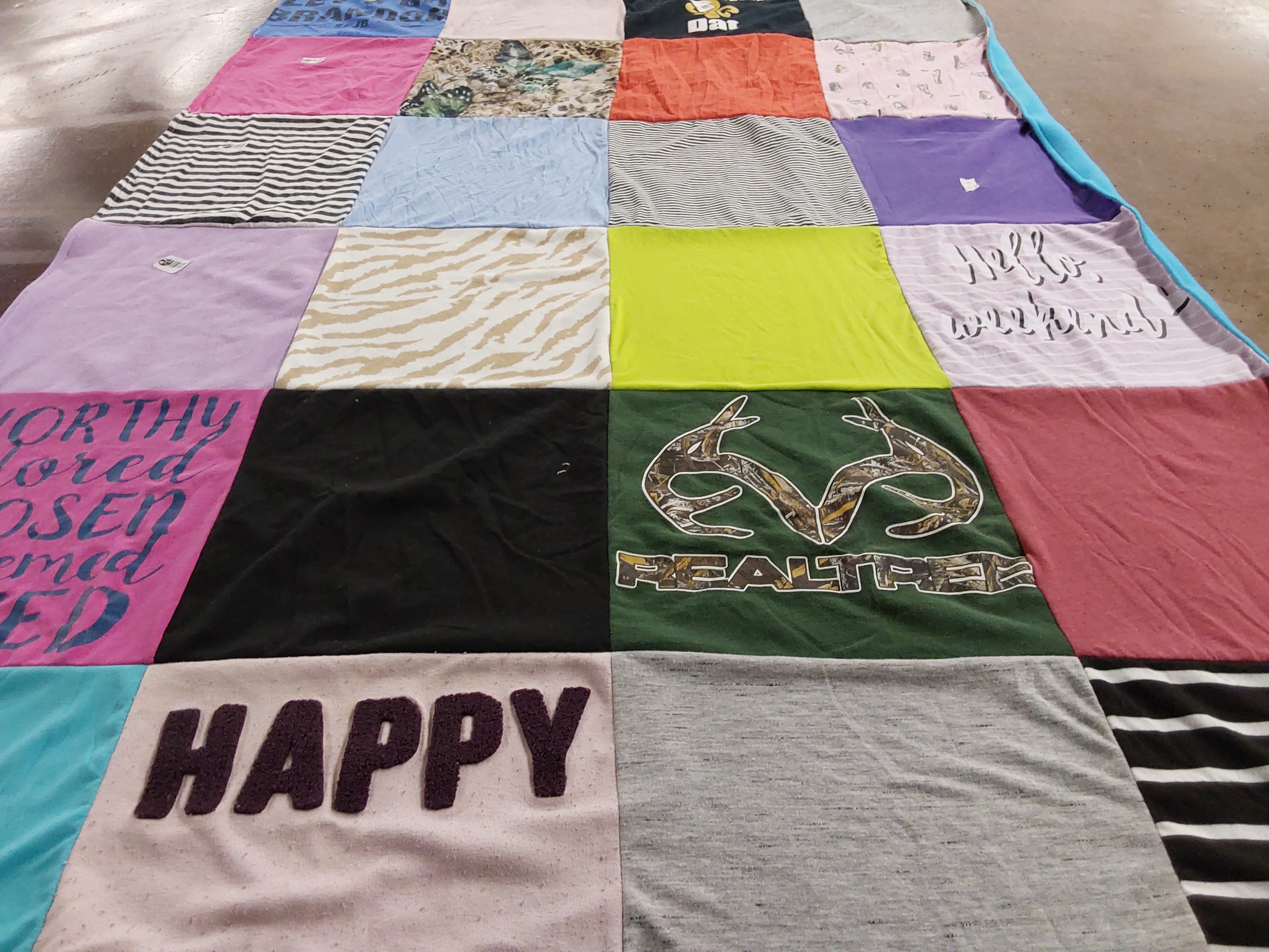 T-shirt quilt with outdoor activities, hunting themes by Kandace from LA