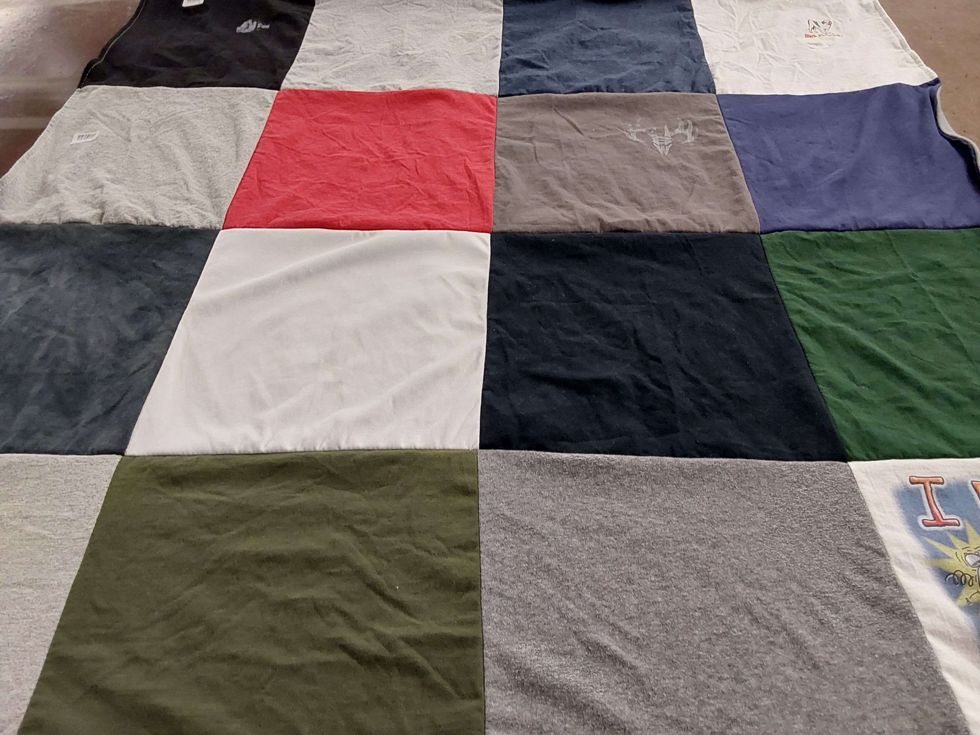 T-shirt quilt with outdoors, sports themes by Kayle from PA