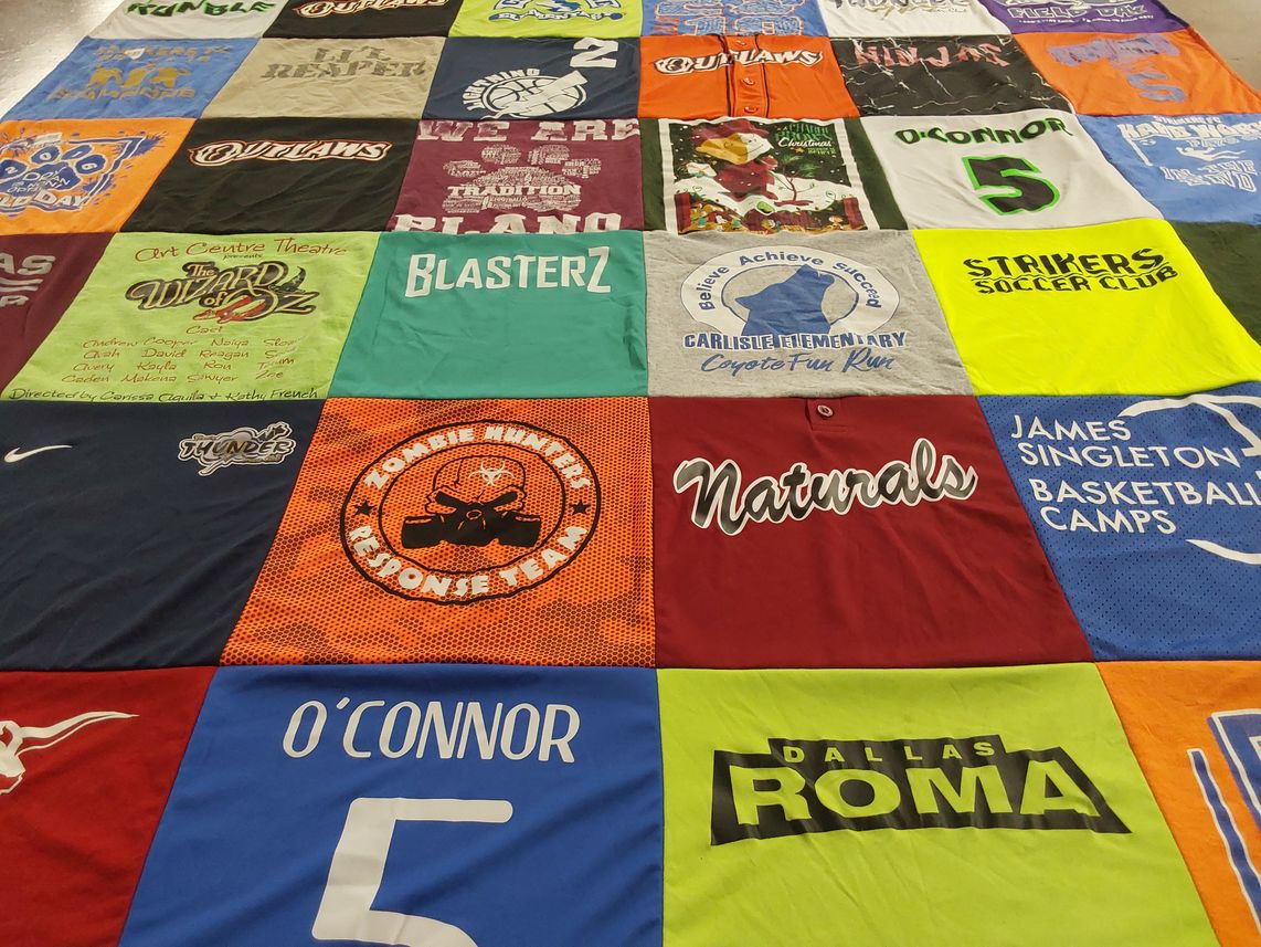 T-shirt quilt featuring outlaws, naturals by Julie from TX