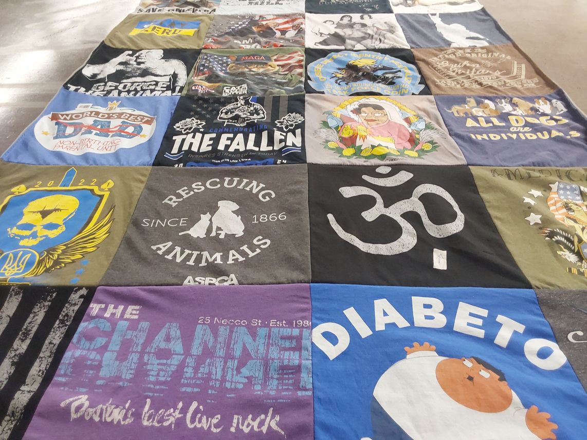 T-shirt quilt with animal welfare, music themes by Emily from MA