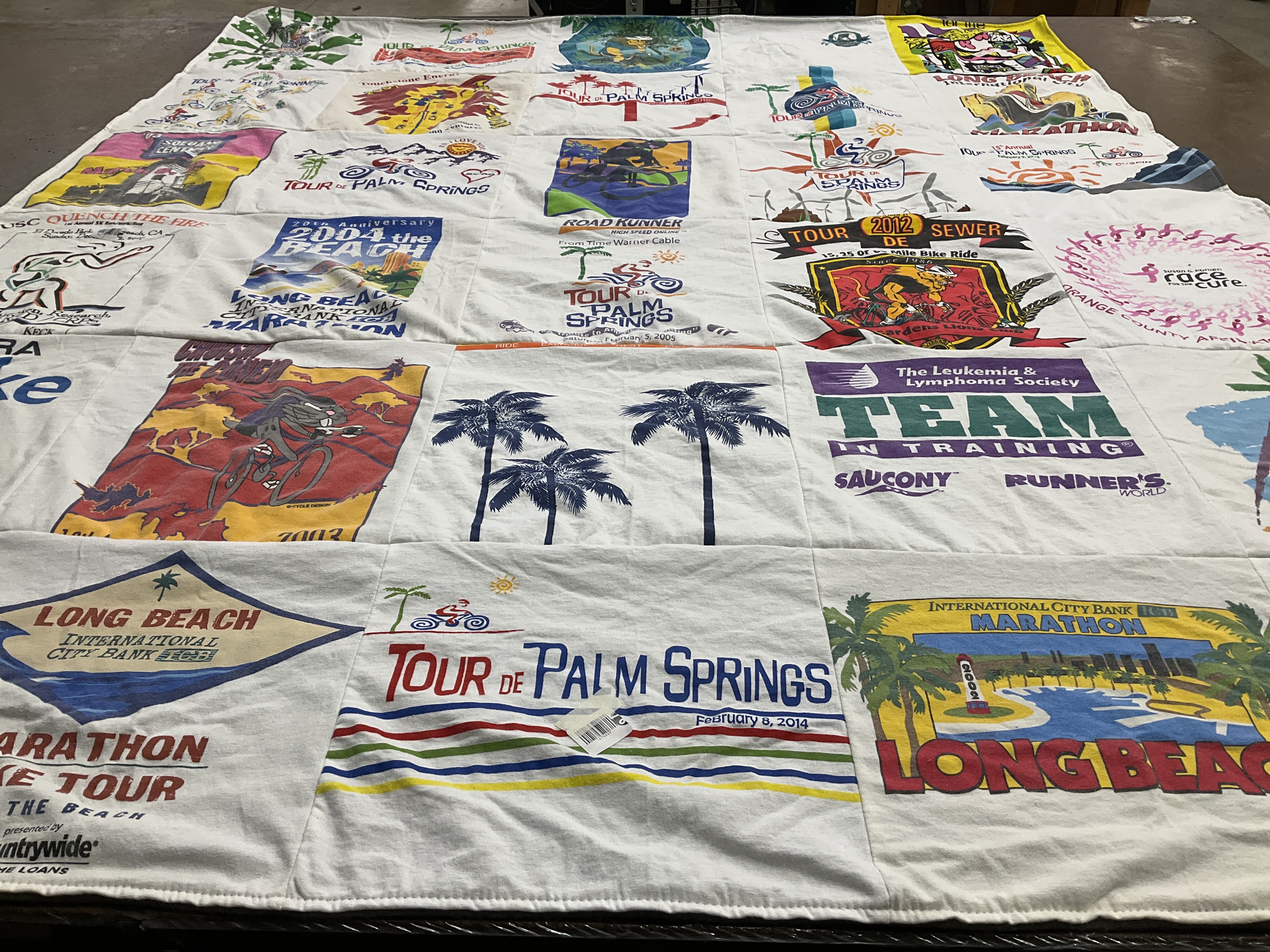 T-shirt quilt with running, cycling themes by Tony from CA