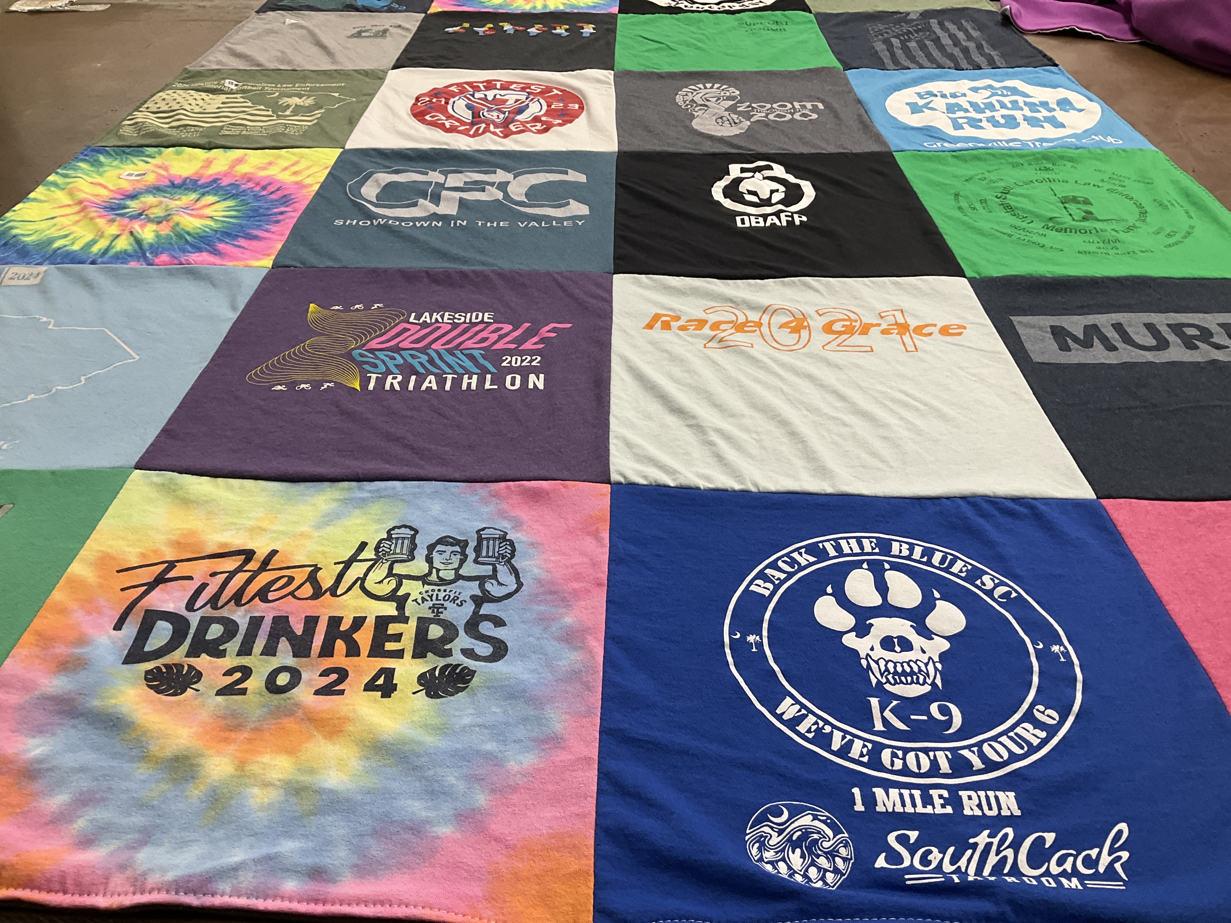T-shirt quilt with sports, triathlons themes by Jennifer from SC