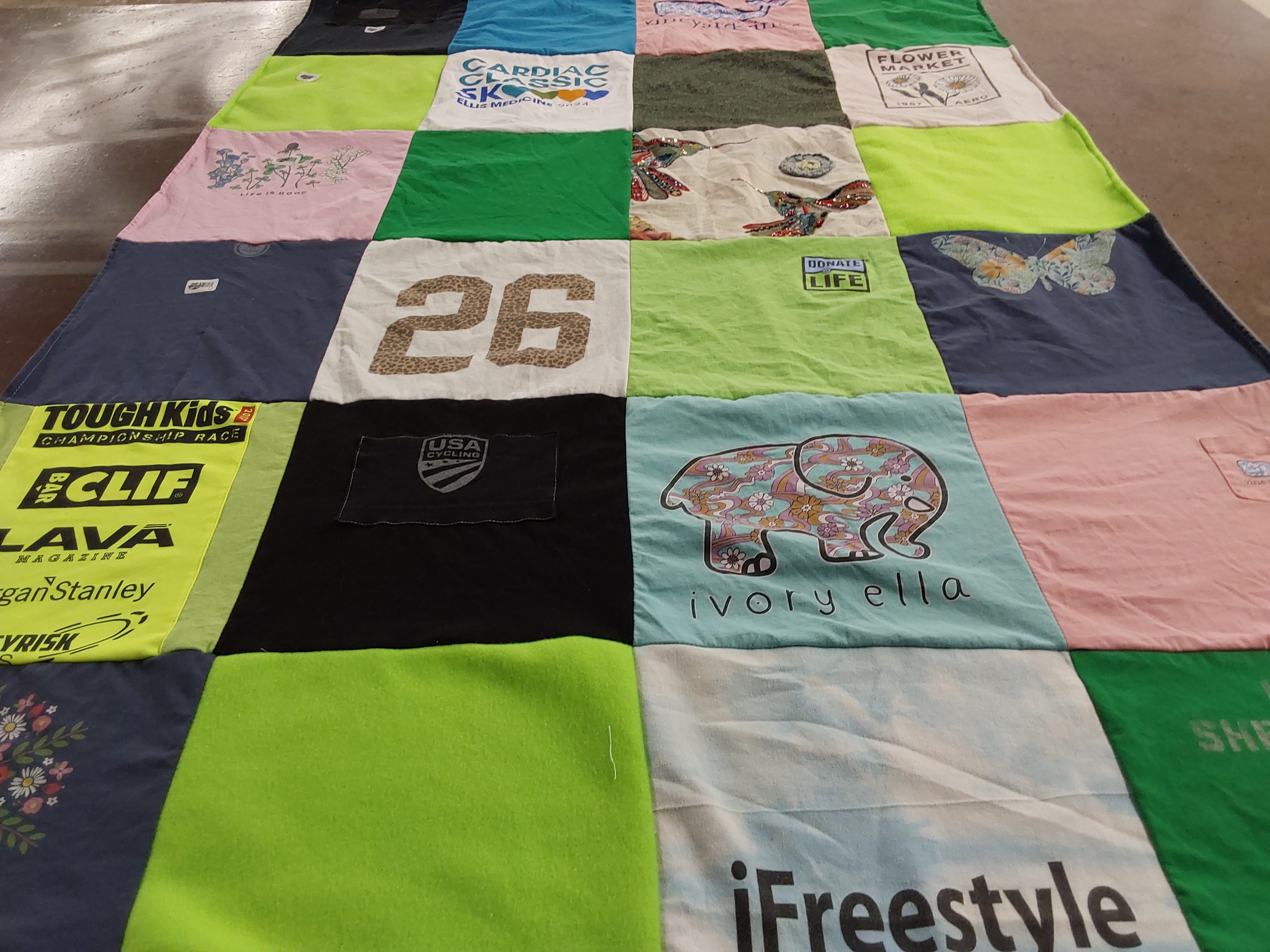 T-shirt quilt with cycling, fitness themes by Cynthia from NY