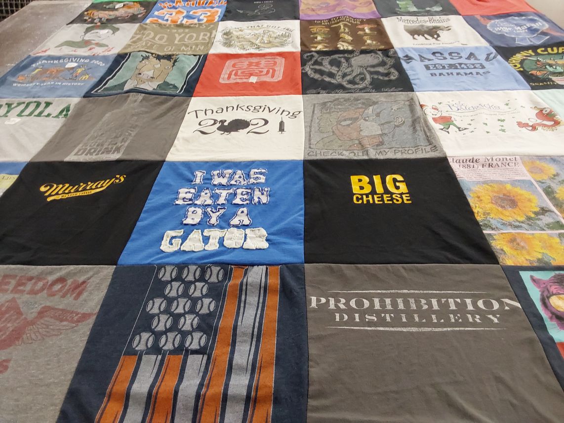 T-shirt quilt with drinking, travel themes by Elizabeth from NC
