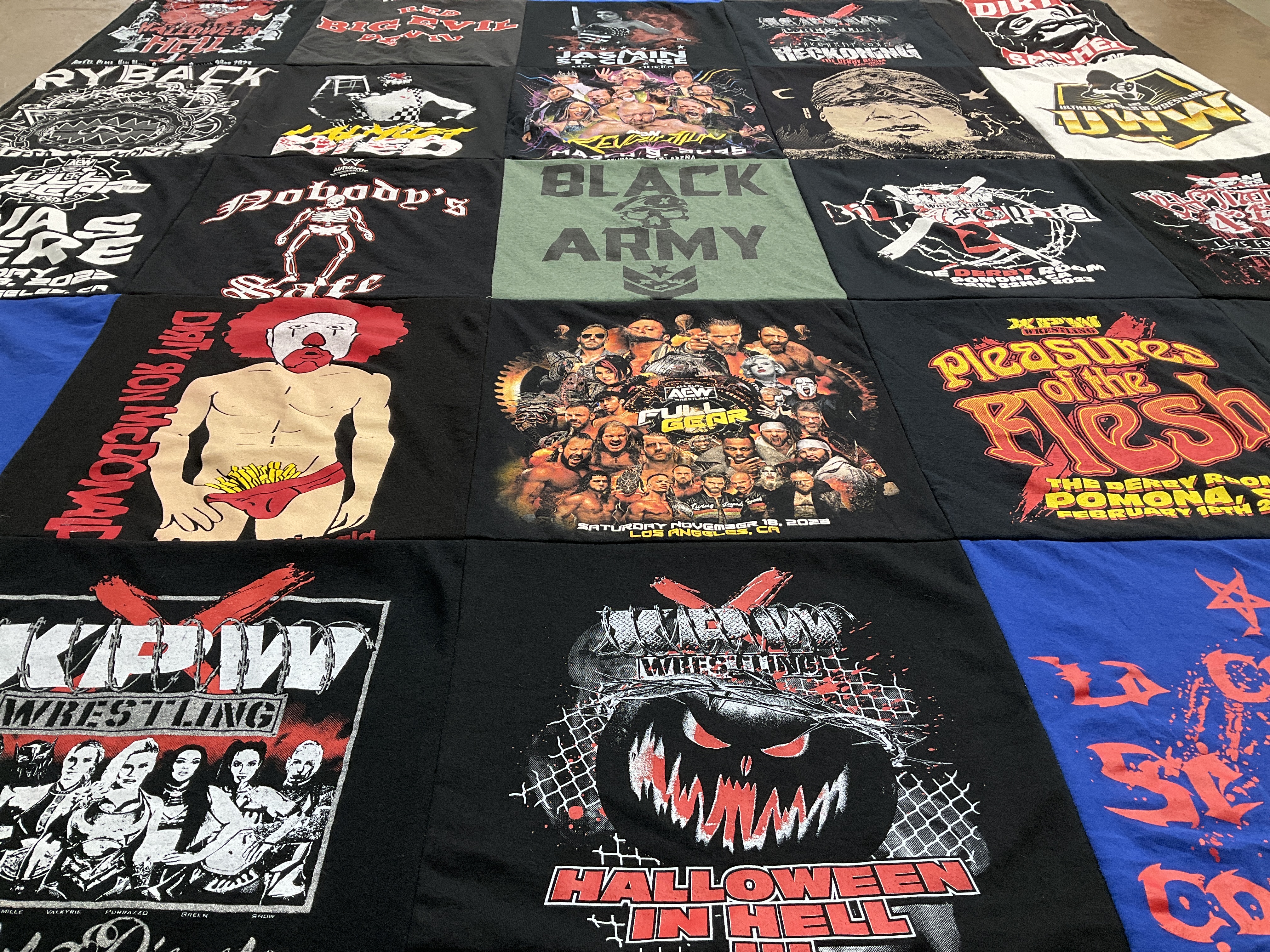 T-shirt quilt with wrestling themes by Justo from CA