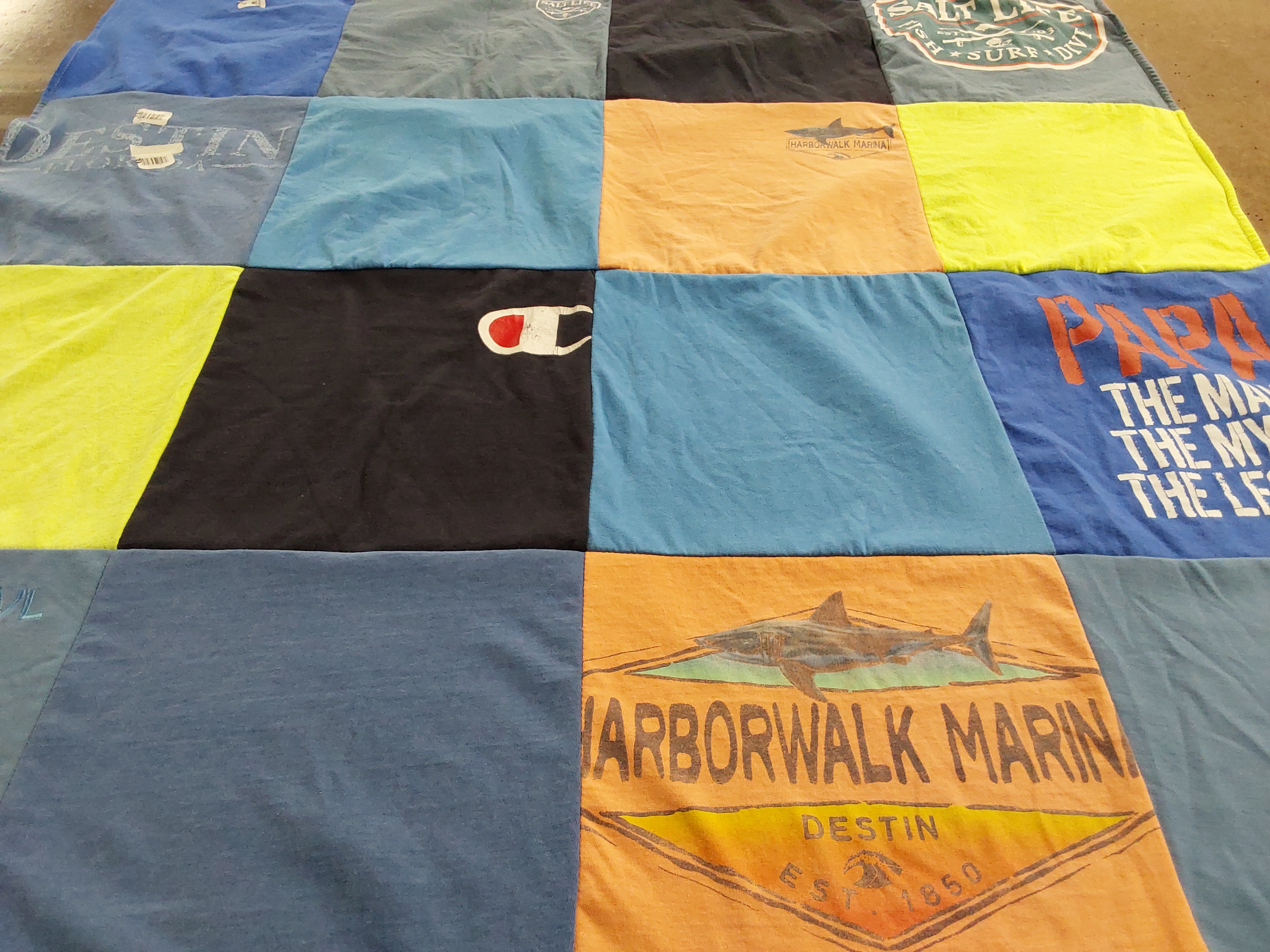 T-shirt quilt with beach, fishing themes by Helena from CO