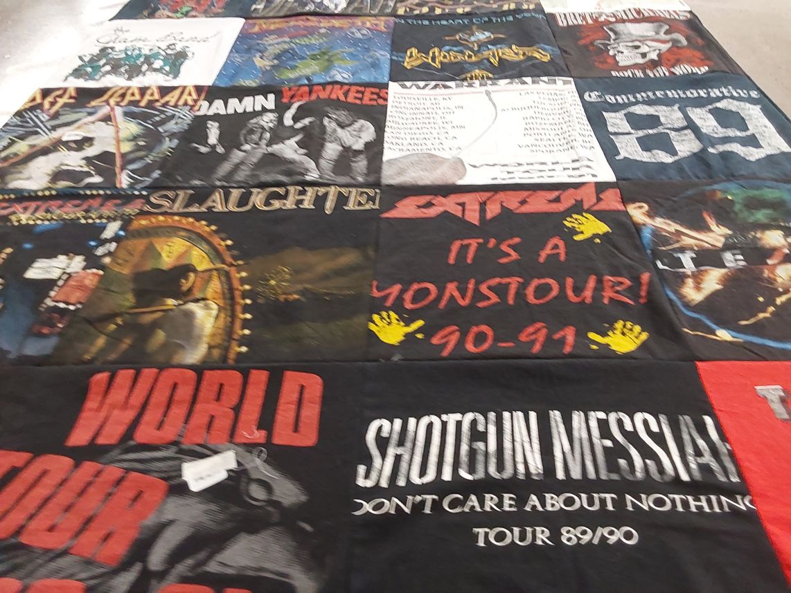 T-shirt quilt with music, concerts themes by Ingrid from WI
