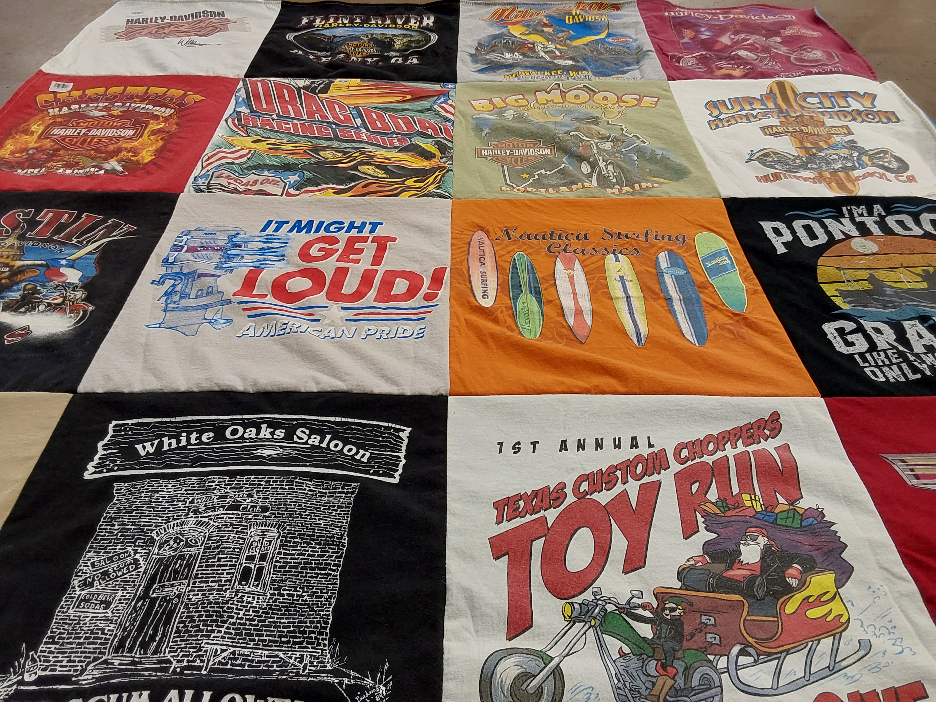 T-shirt quilt with motorcycles, surfing themes by Linda from TX