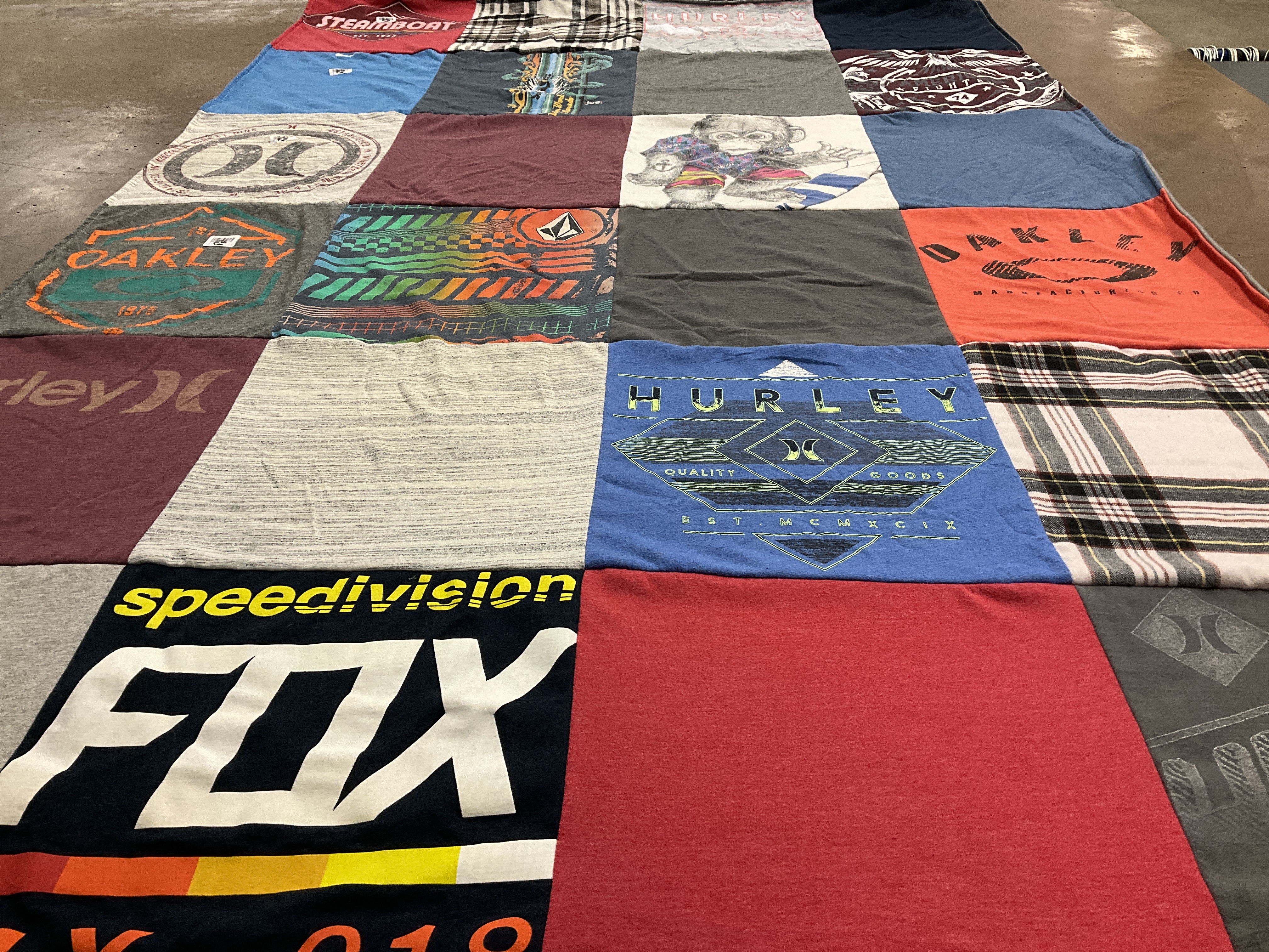 T-shirt quilt with surfing, skateboarding themes by Laura from IA