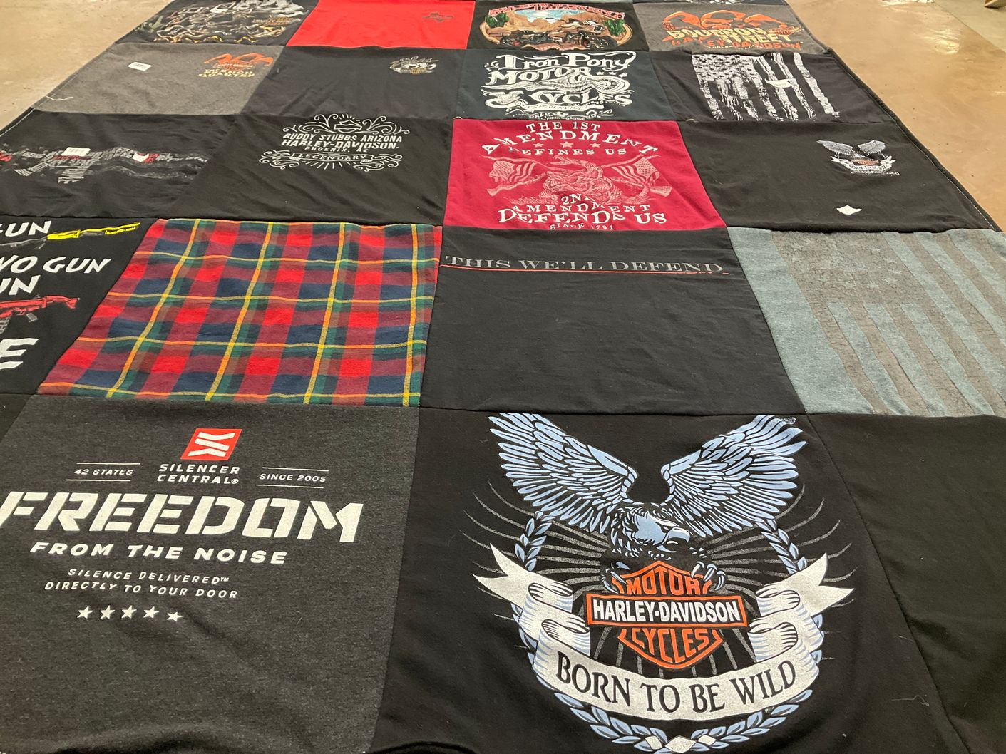 T-shirt quilt with motorcycles, firearms themes by Laurie from TX