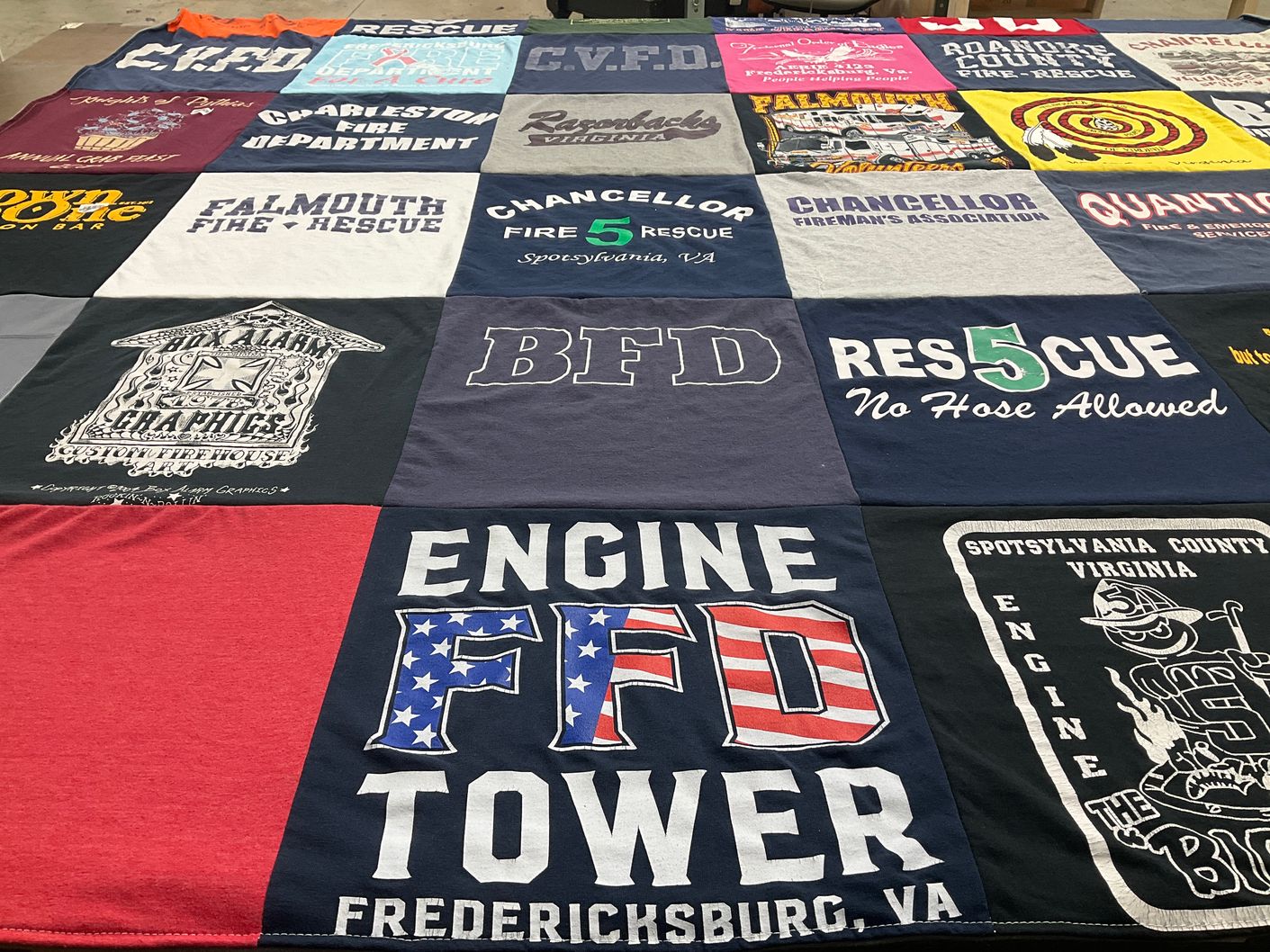 T-shirt quilt with firefighting, emergency services themes by Johnny from VA