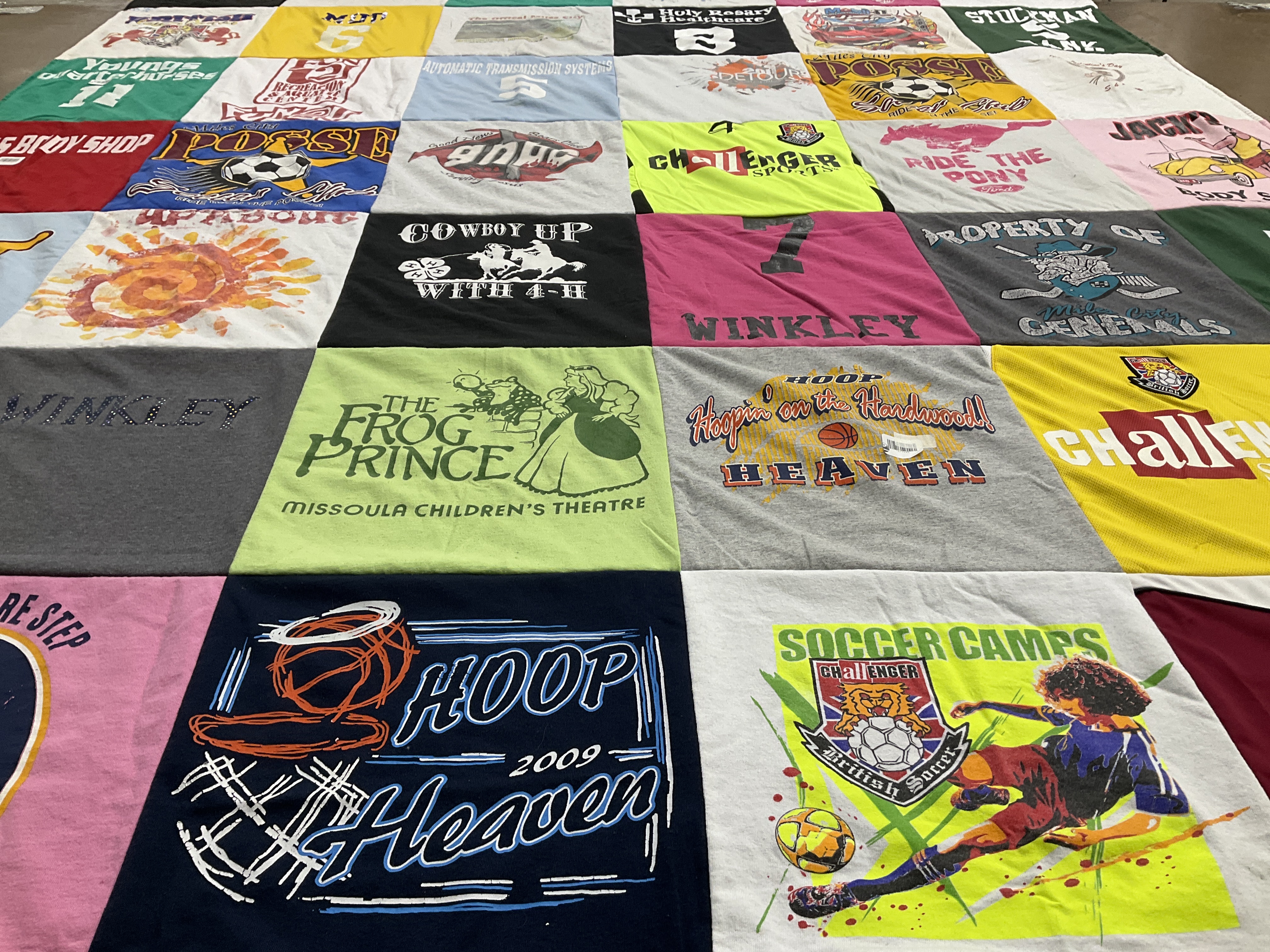 T-shirt quilt with theatre, sports themes by Jennifer from MT