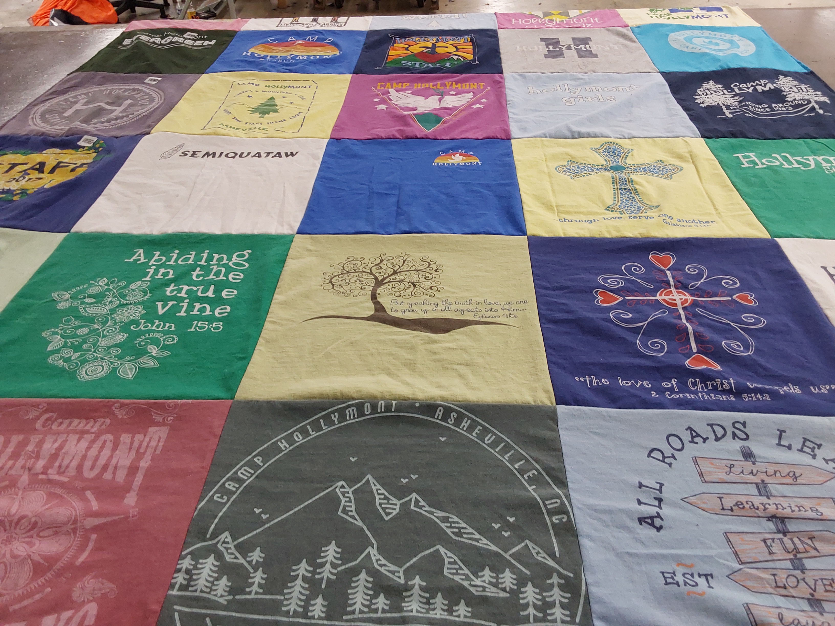 T-shirt quilt with camping, community themes by Elizabeth from SC