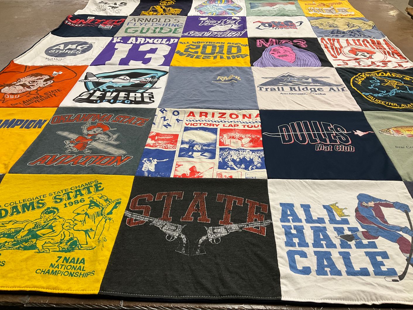 T-shirt quilt from oklahoma state university, adams state university by Rachel from CO
