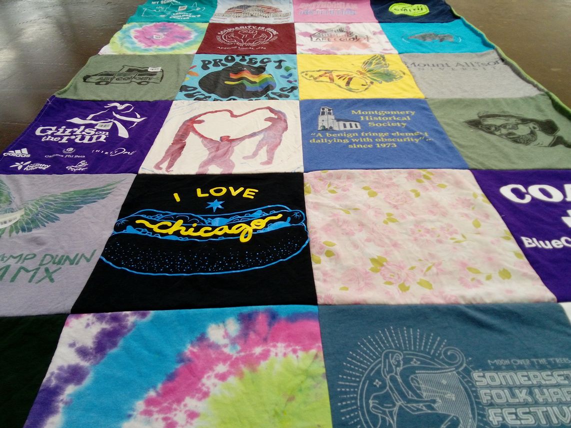 T-shirt quilt with historical, running themes by SARA from VT