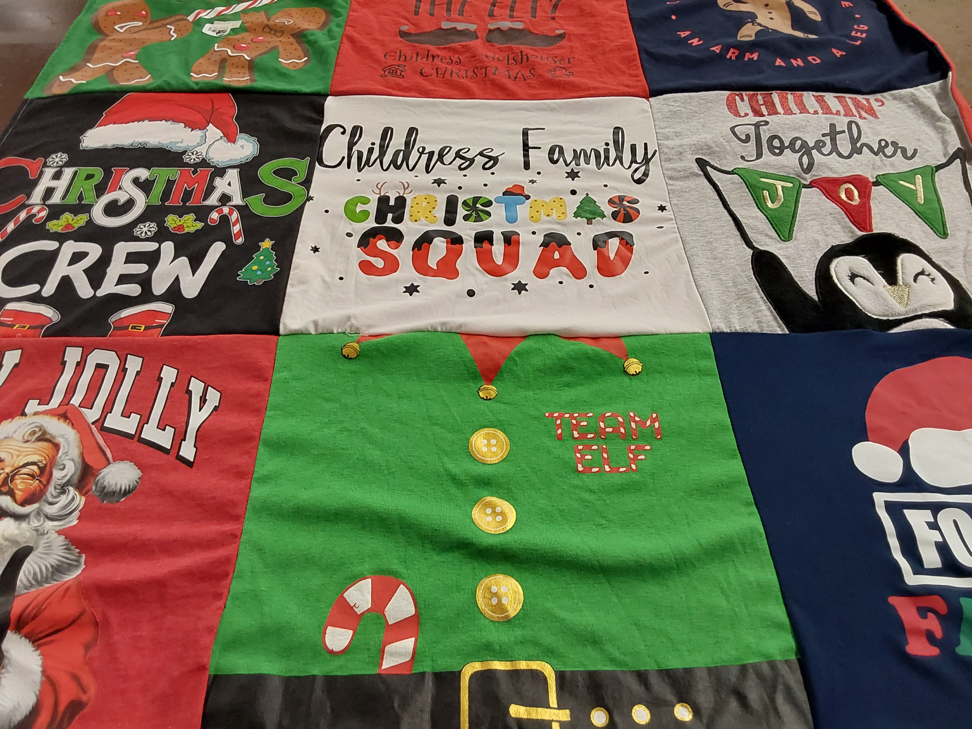 T-shirt quilt with christmas, family gatherings themes by BROOKE from NC