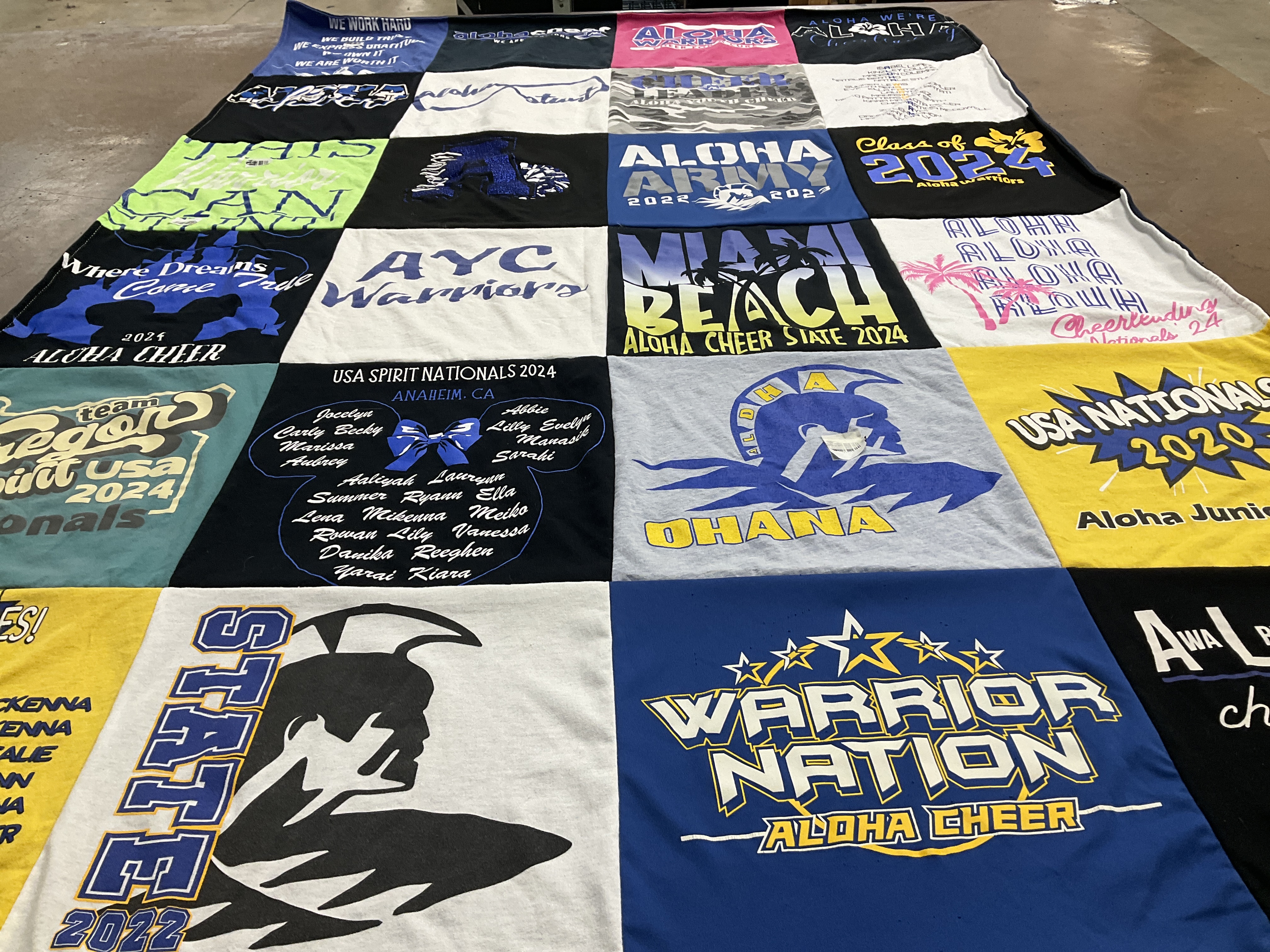 T-shirt quilt with cheerleading themes by Gary from OR