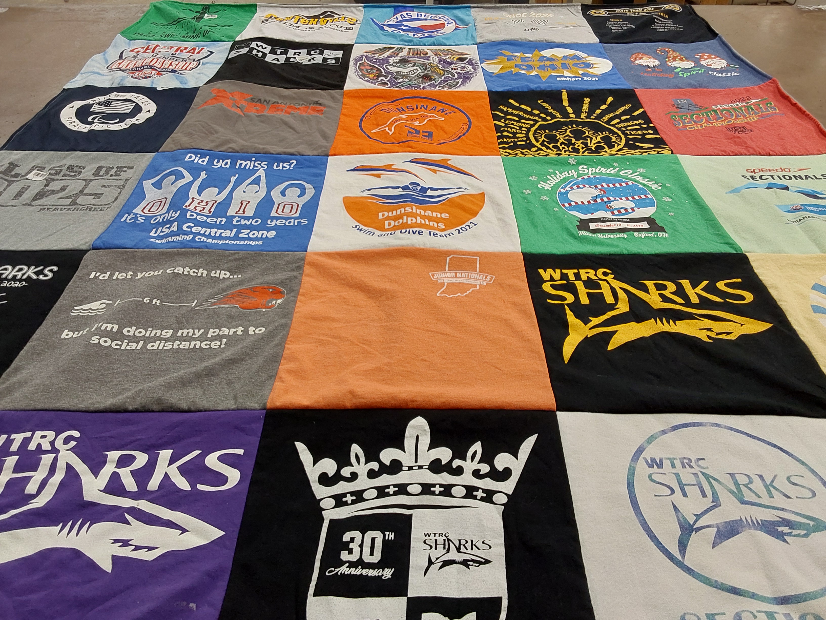 T-shirt quilt with swimming, sports themes by Amy from OH