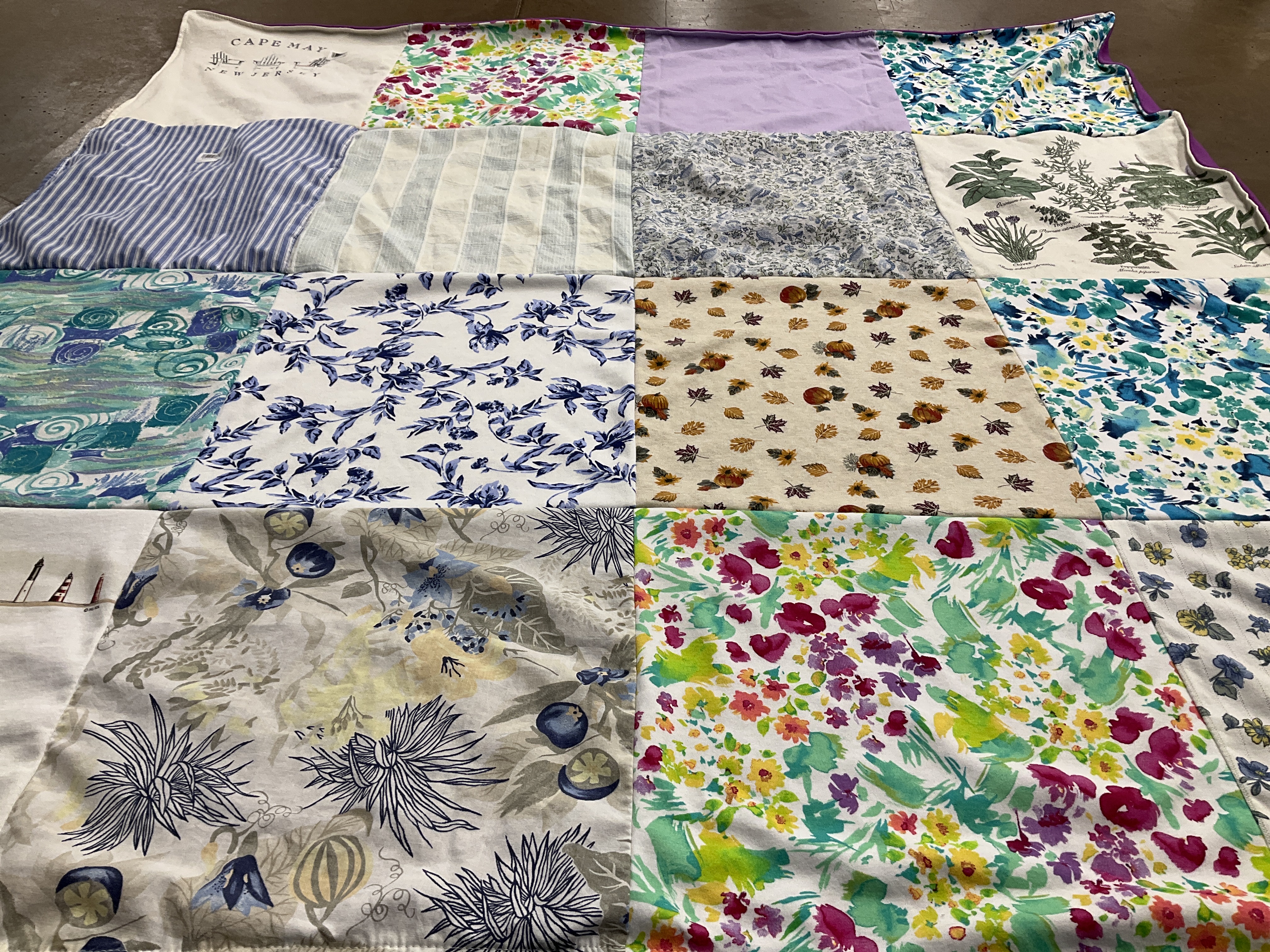 T-shirt quilt with floral patterns, textiles themes by Jen from OH