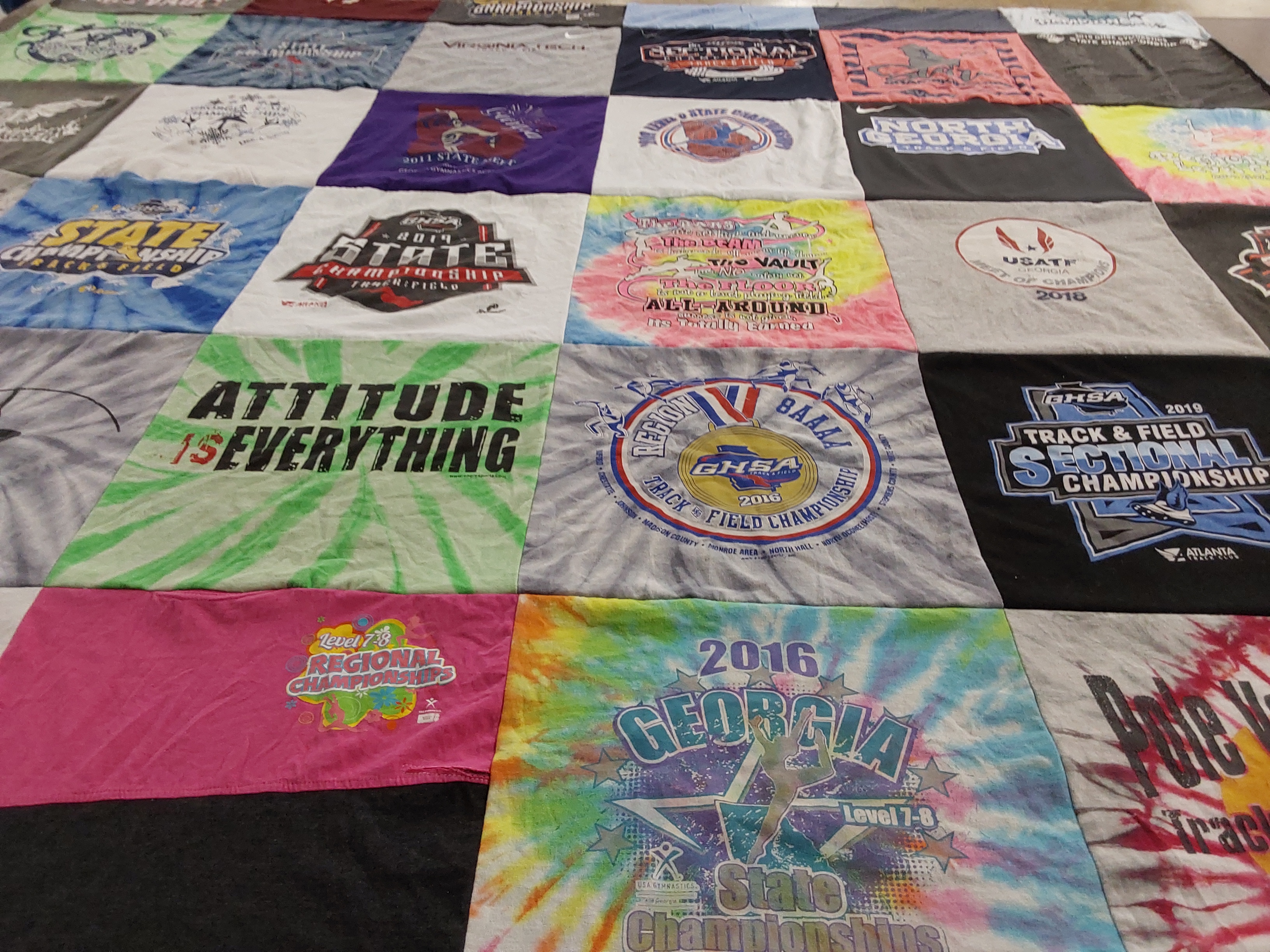 T-shirt quilt with sports, track and field themes by Brandy from GA