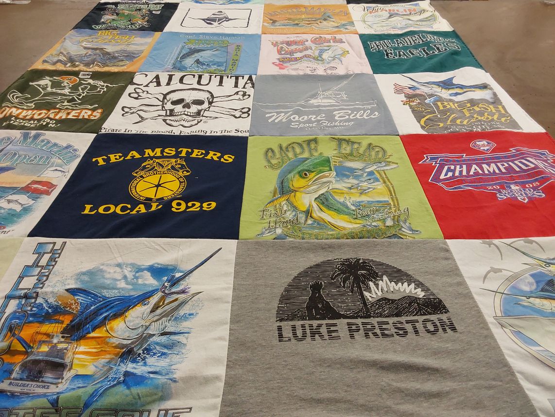 T-shirt quilt with fishing, sports themes by Patricia from PA