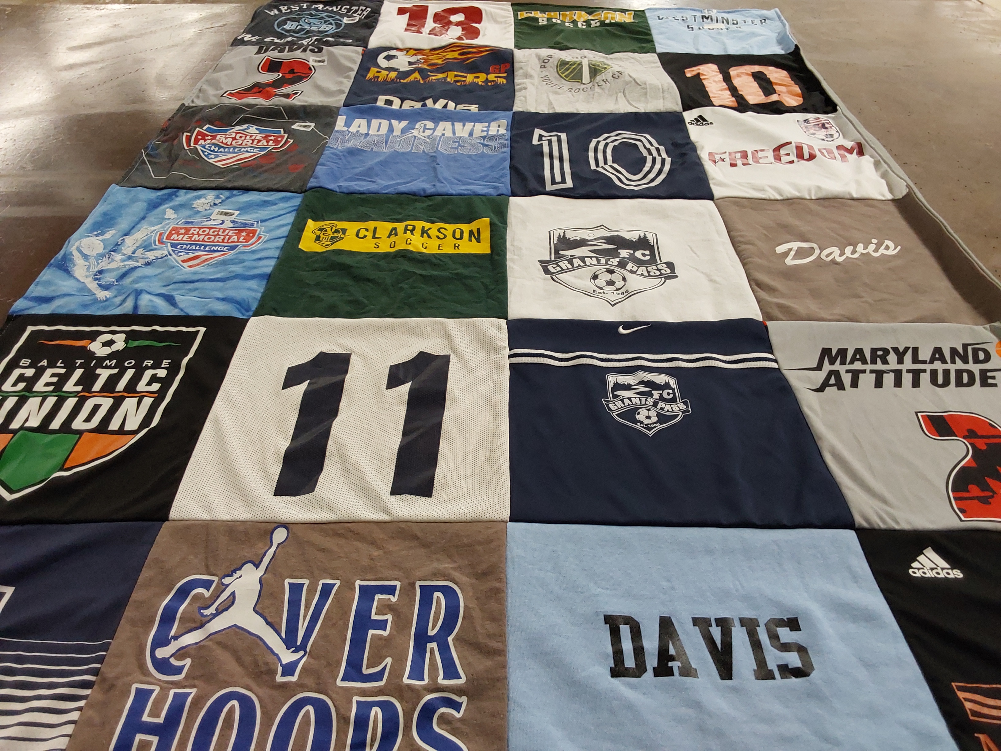 T-shirt quilt featuring grants pass soccer club by Emily from MD