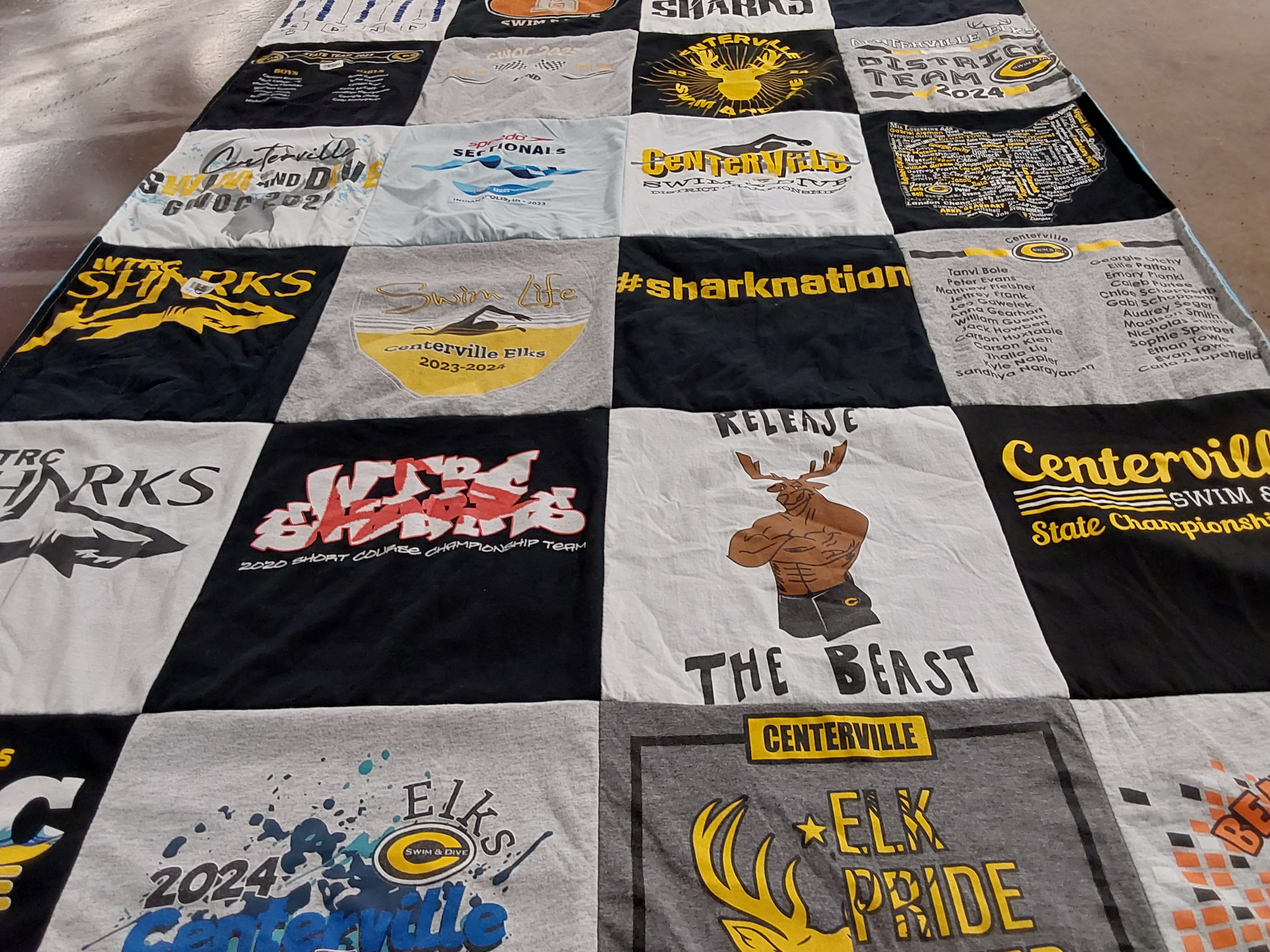 T-shirt quilt featuring centerville swim team by Amy from OH
