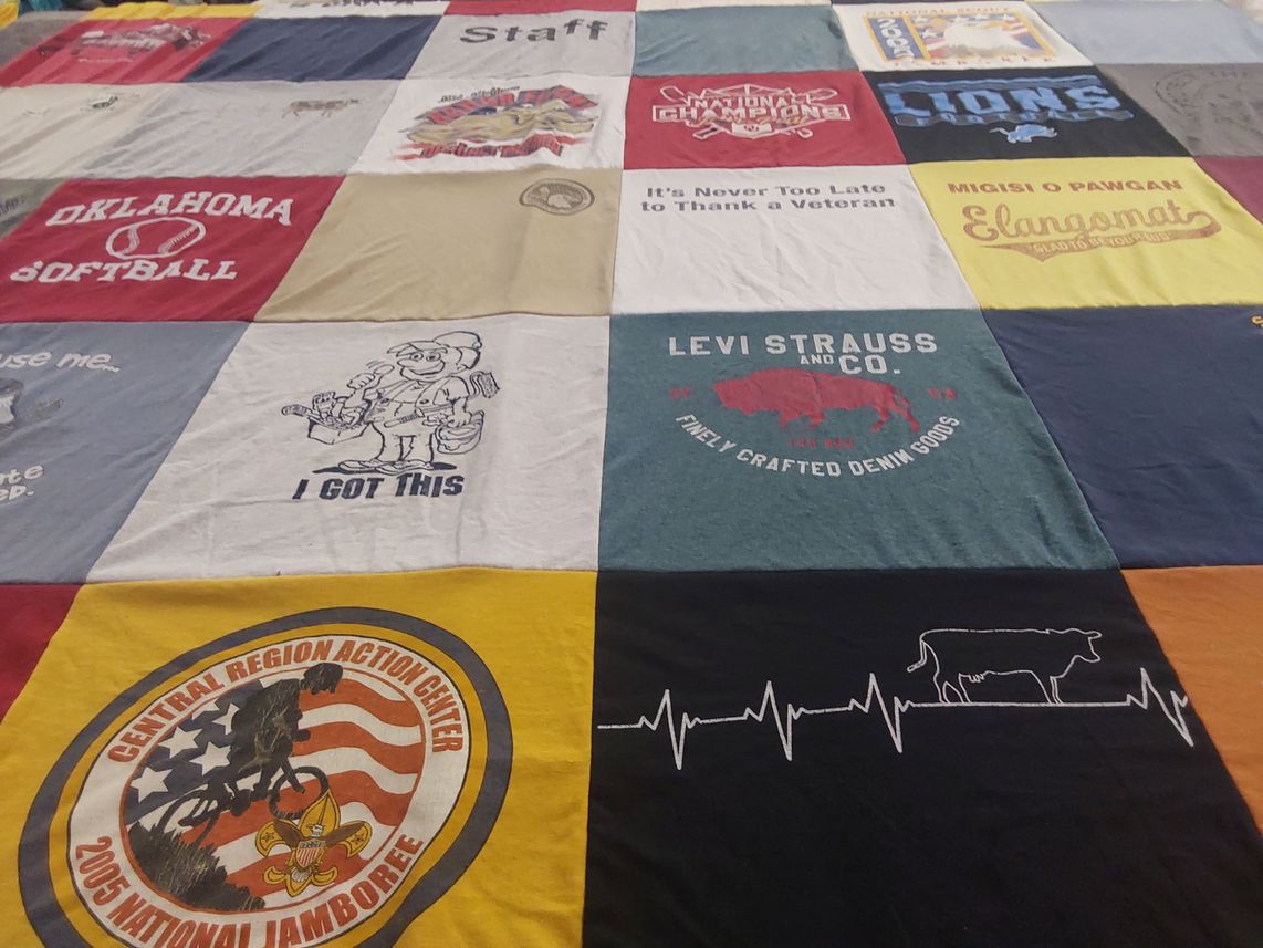 T-shirt quilt with sports, veteran themes by Lynn from MI