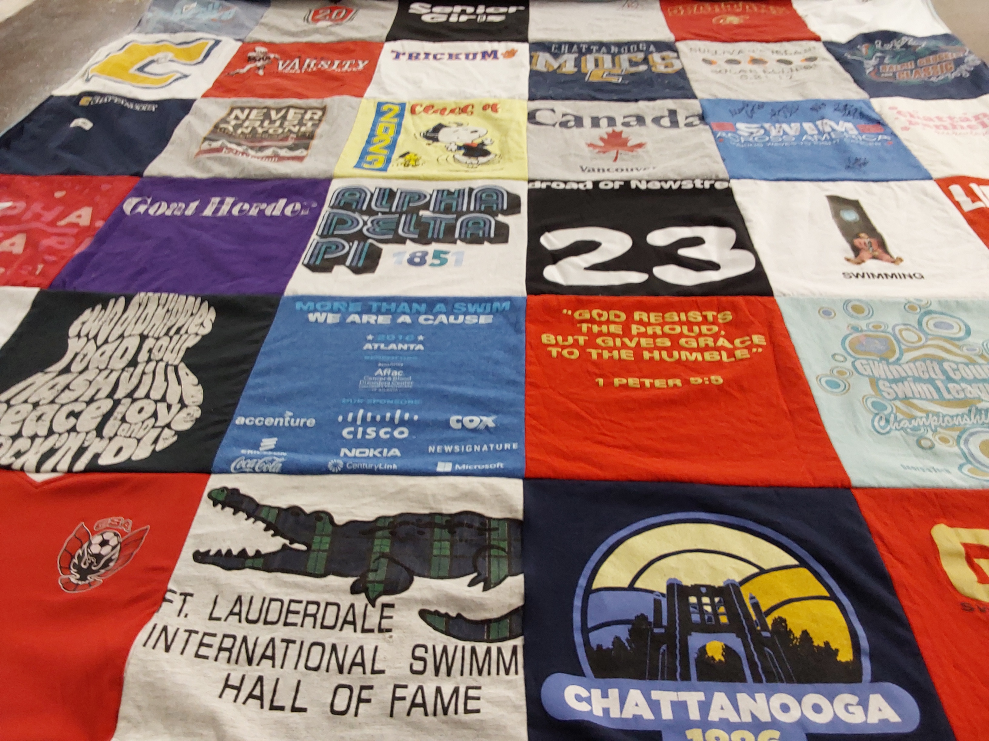 T-shirt quilt with swimming, sports themes by Mary from GA