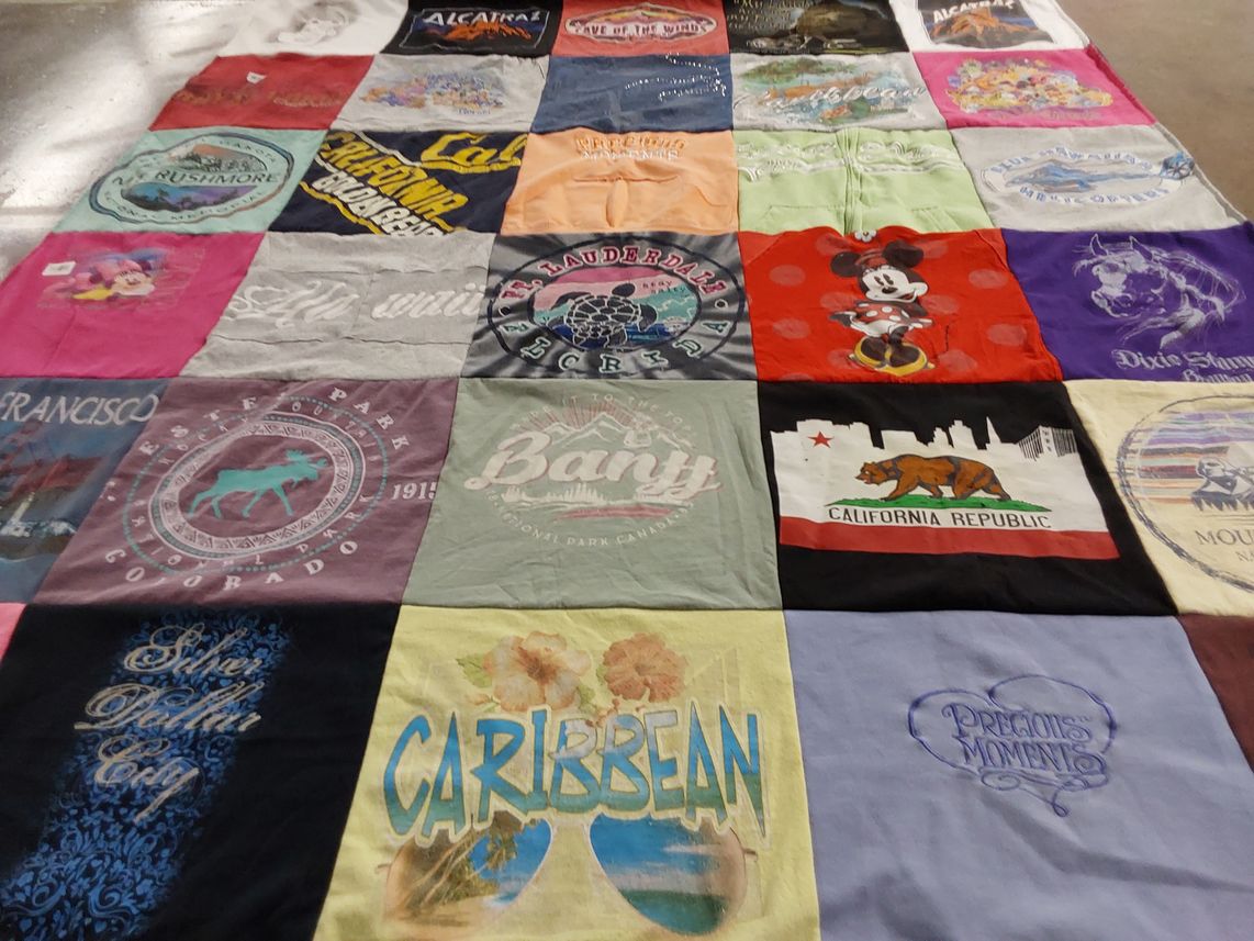 T-shirt quilt with travel, tourism themes by Darla from CO