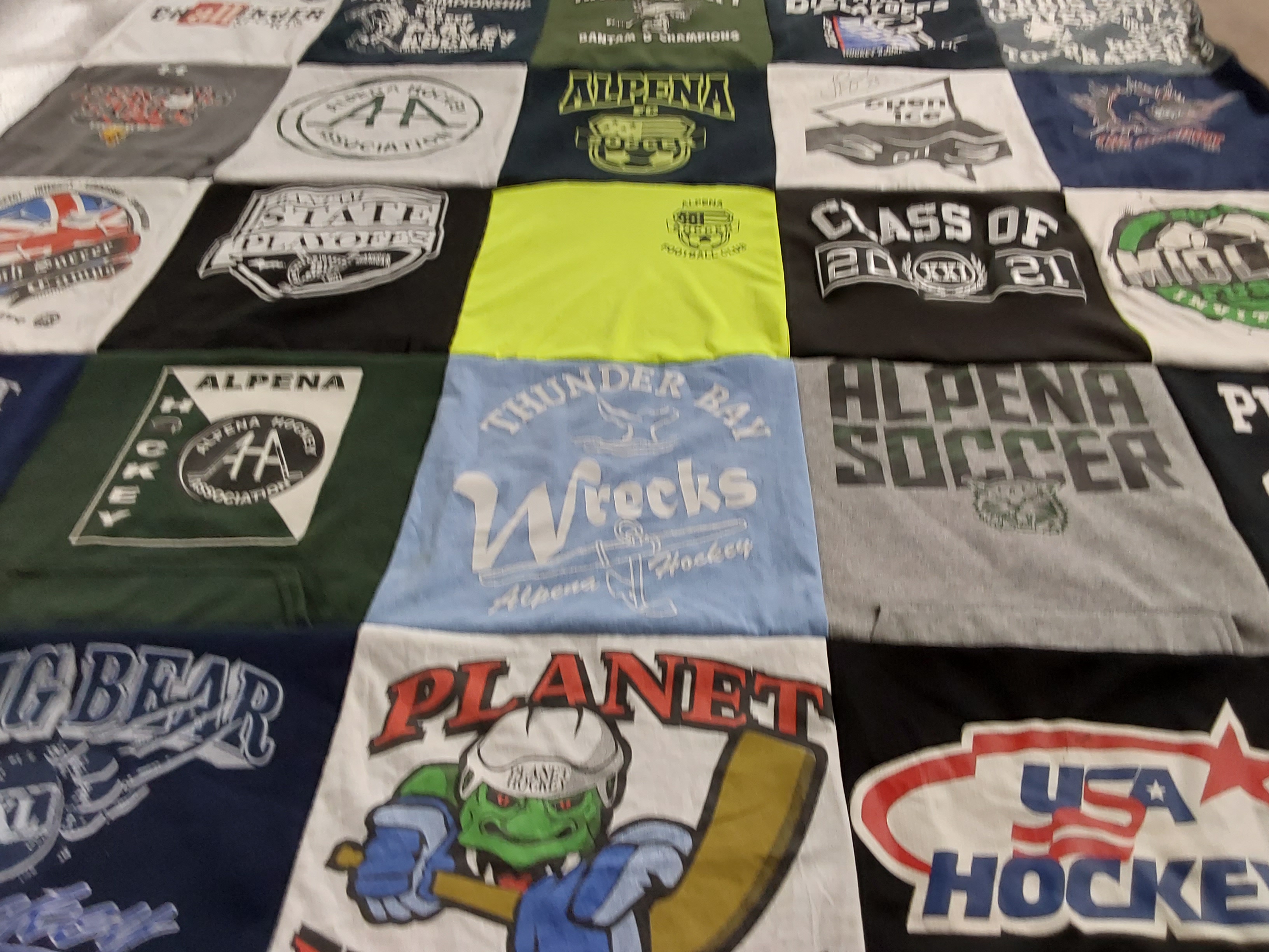T-shirt quilt featuring alphena hockey, thunder bay wrecks by Janelle from MI