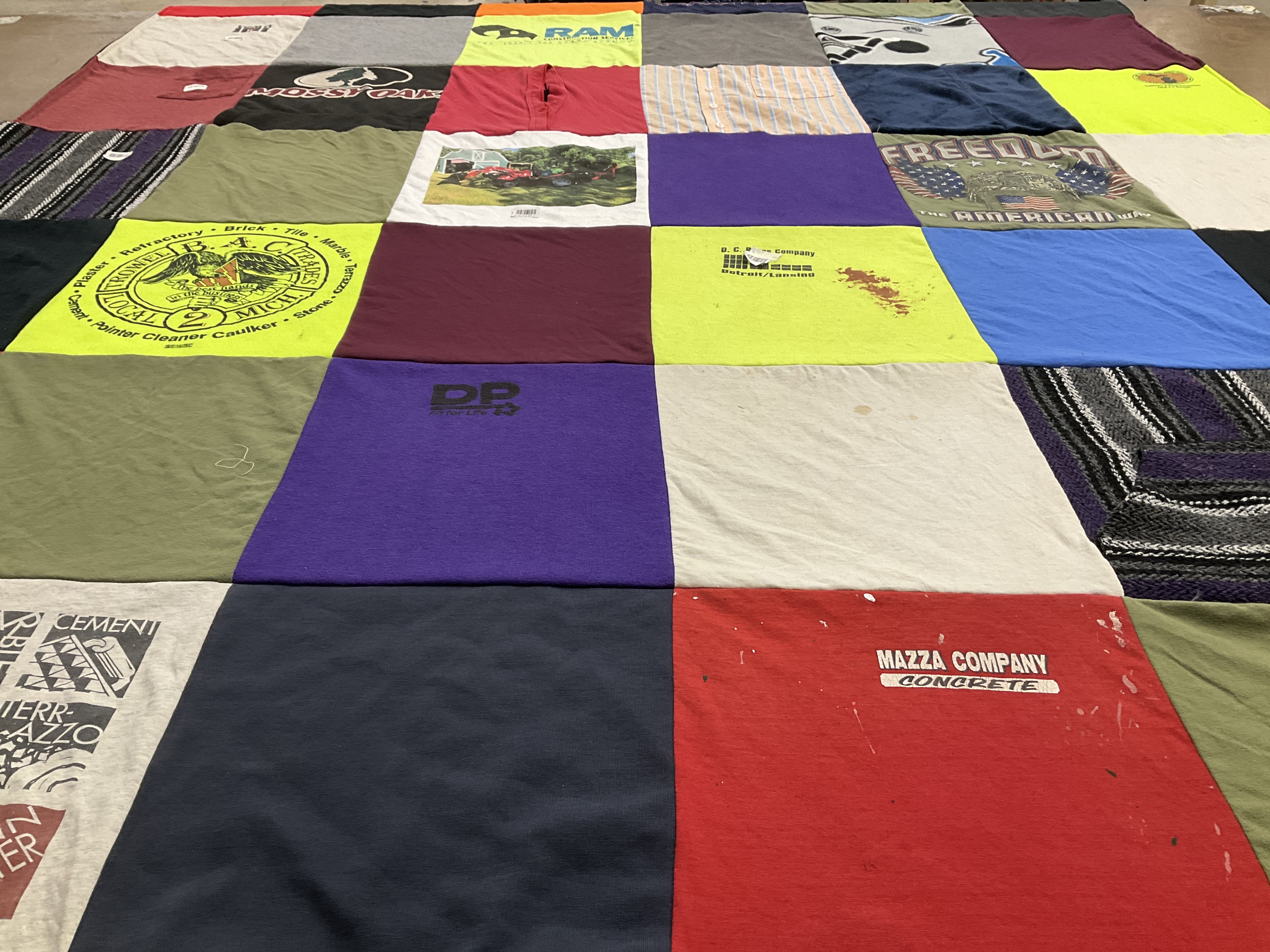 T-shirt quilt with sports, construction themes by Jessica from KY