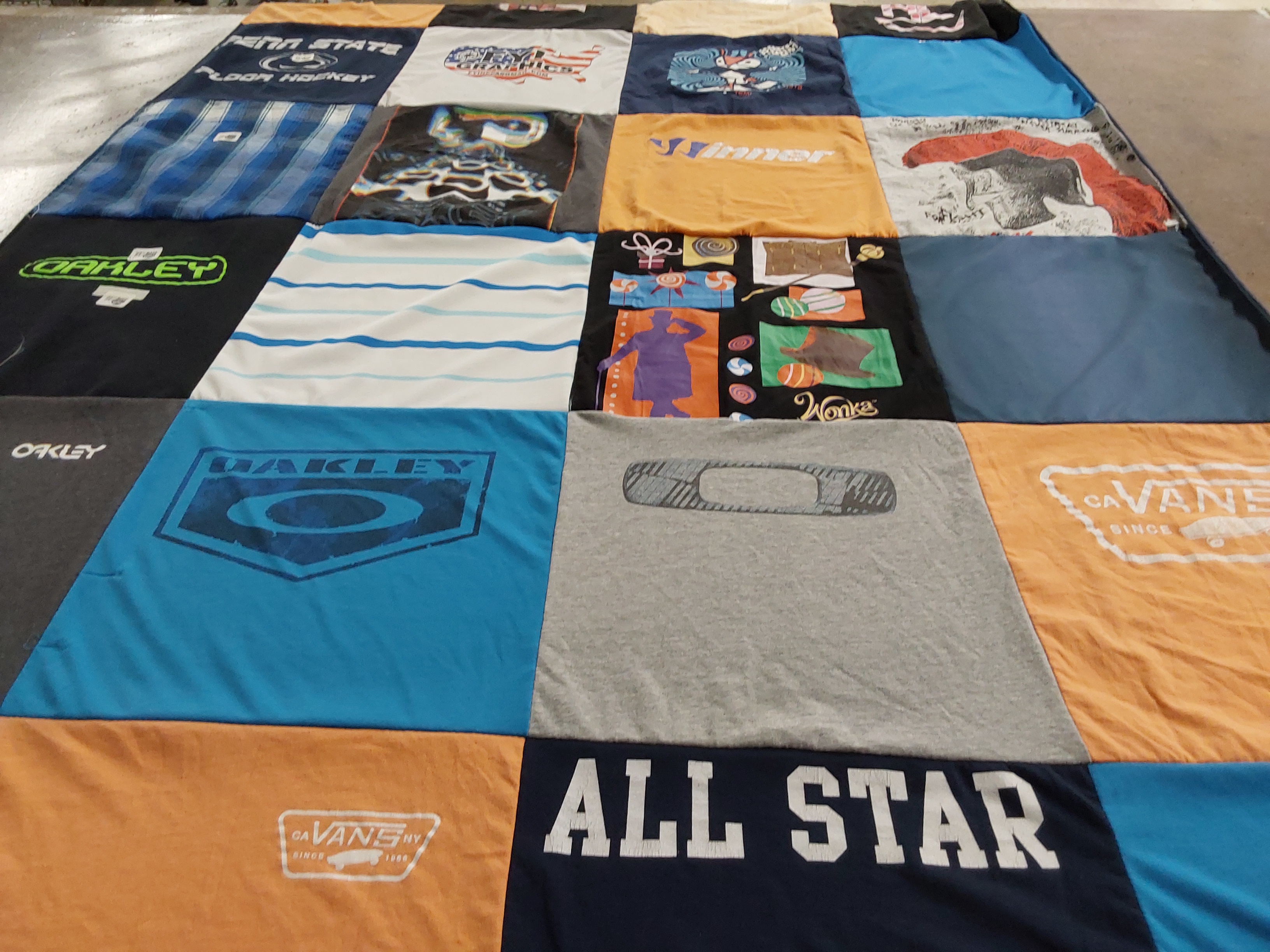 T-shirt quilt with floor hockey, sports themes by Colleen from NY