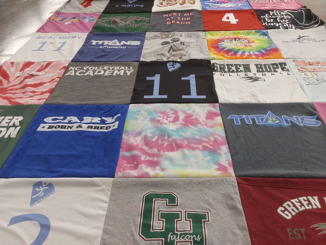 T-shirt quilt featuring green hope high school volleyball, titans swimming by JANIS from NC