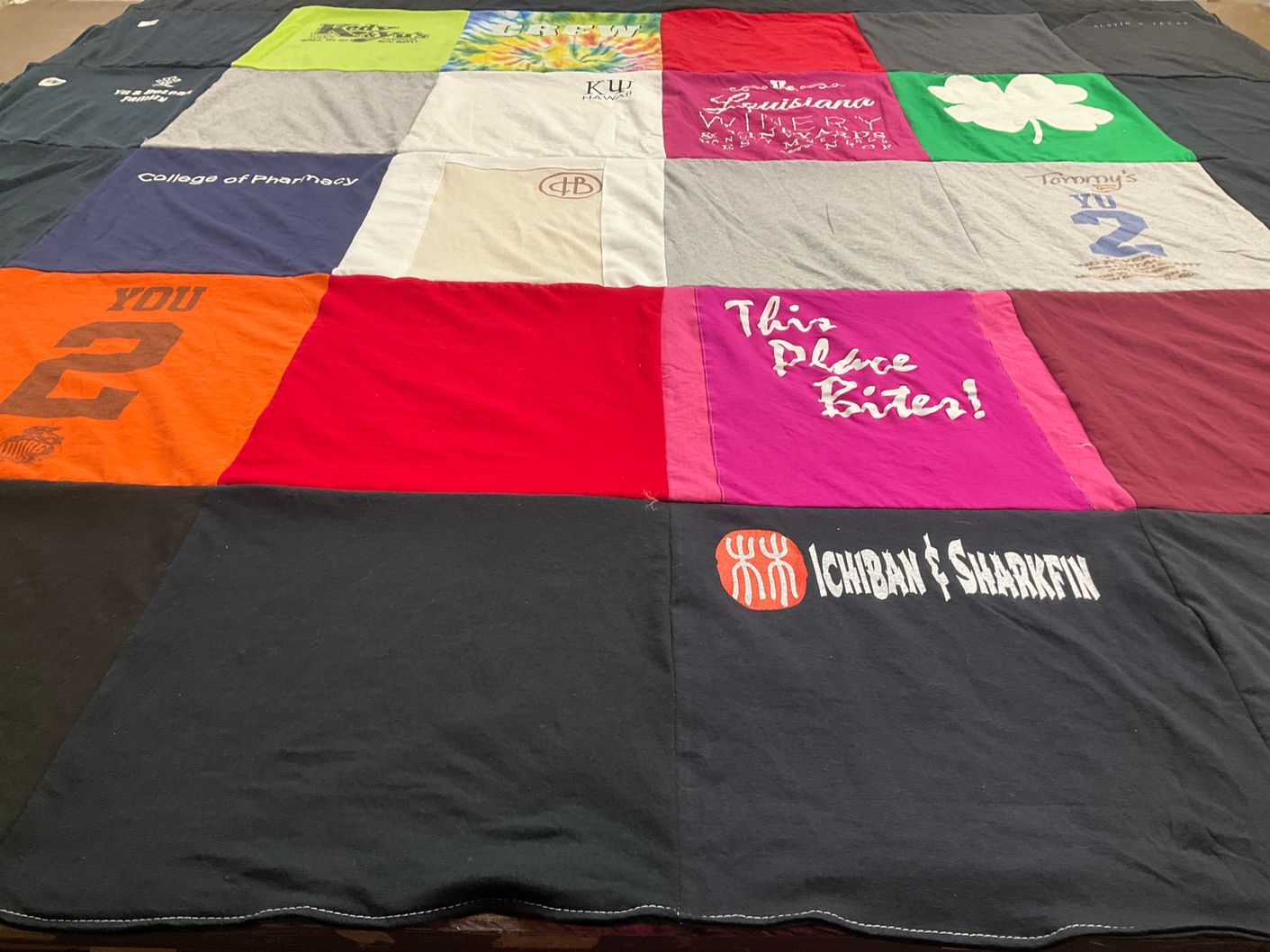 T-shirt quilt with pharmacy, winery themes by Cheryl from AZ