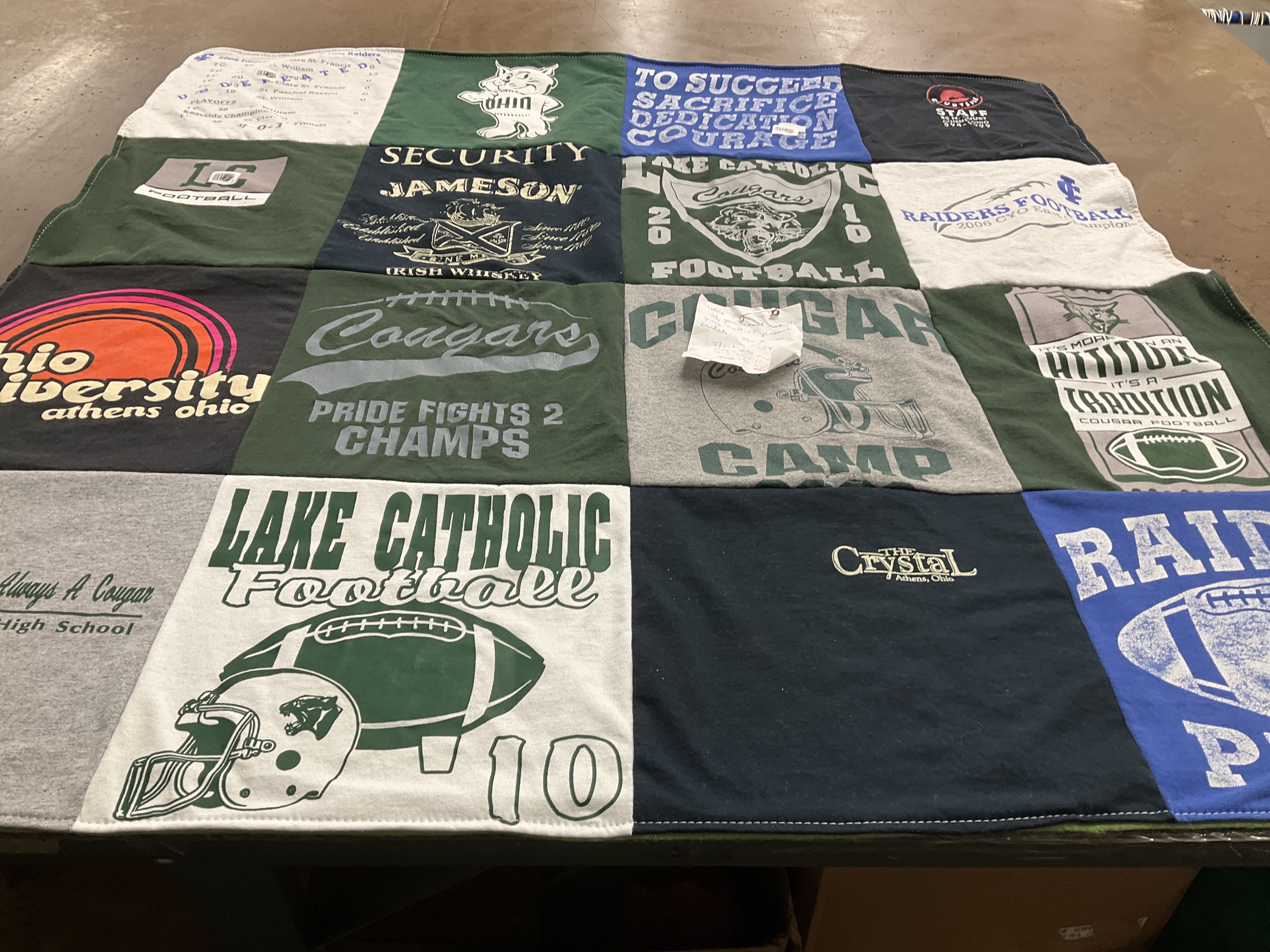 T-shirt quilt featuring cougars, raiders by Claudette from OH