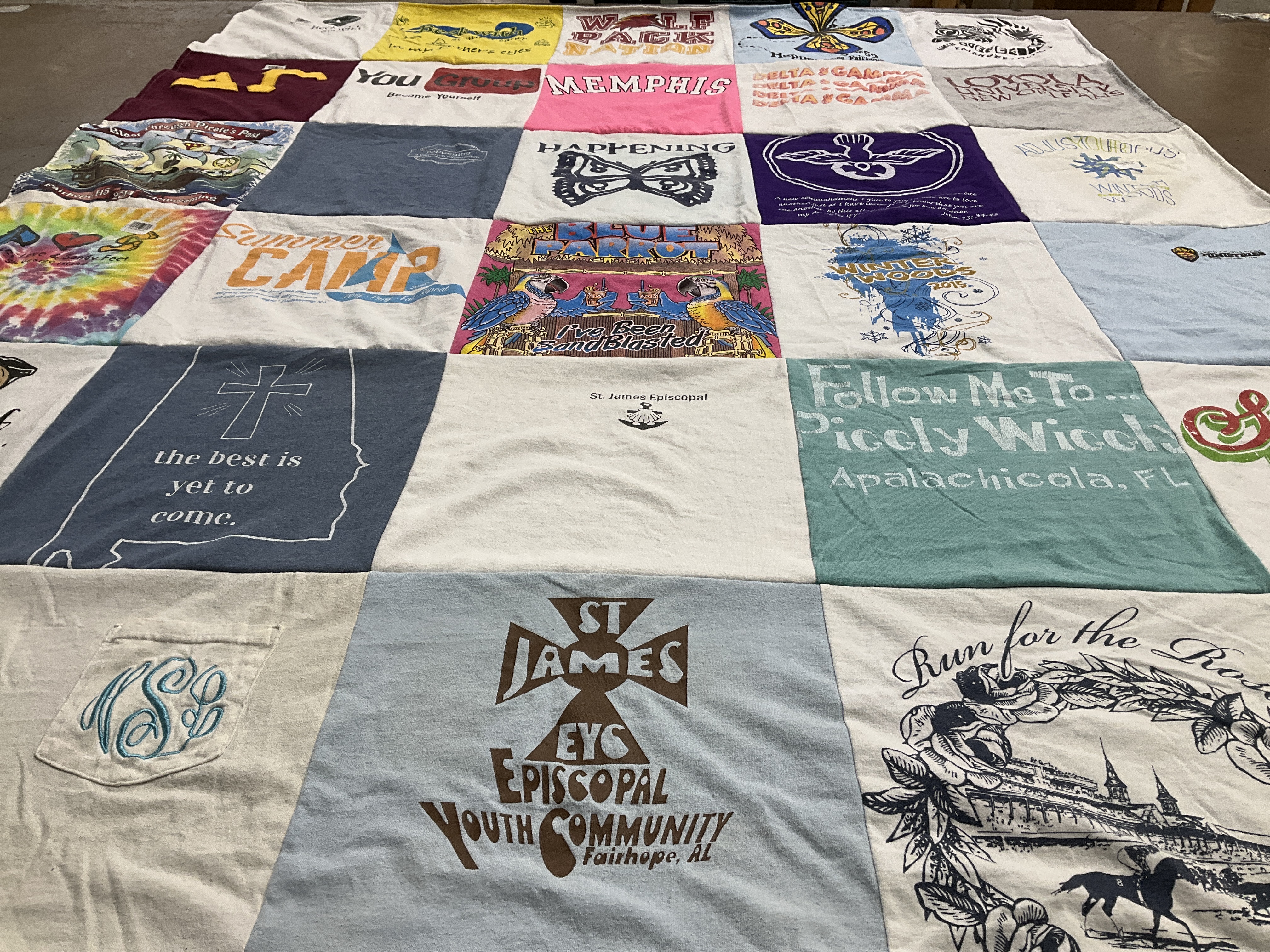 T-shirt quilt with camping, community service themes by Lloyd from LA