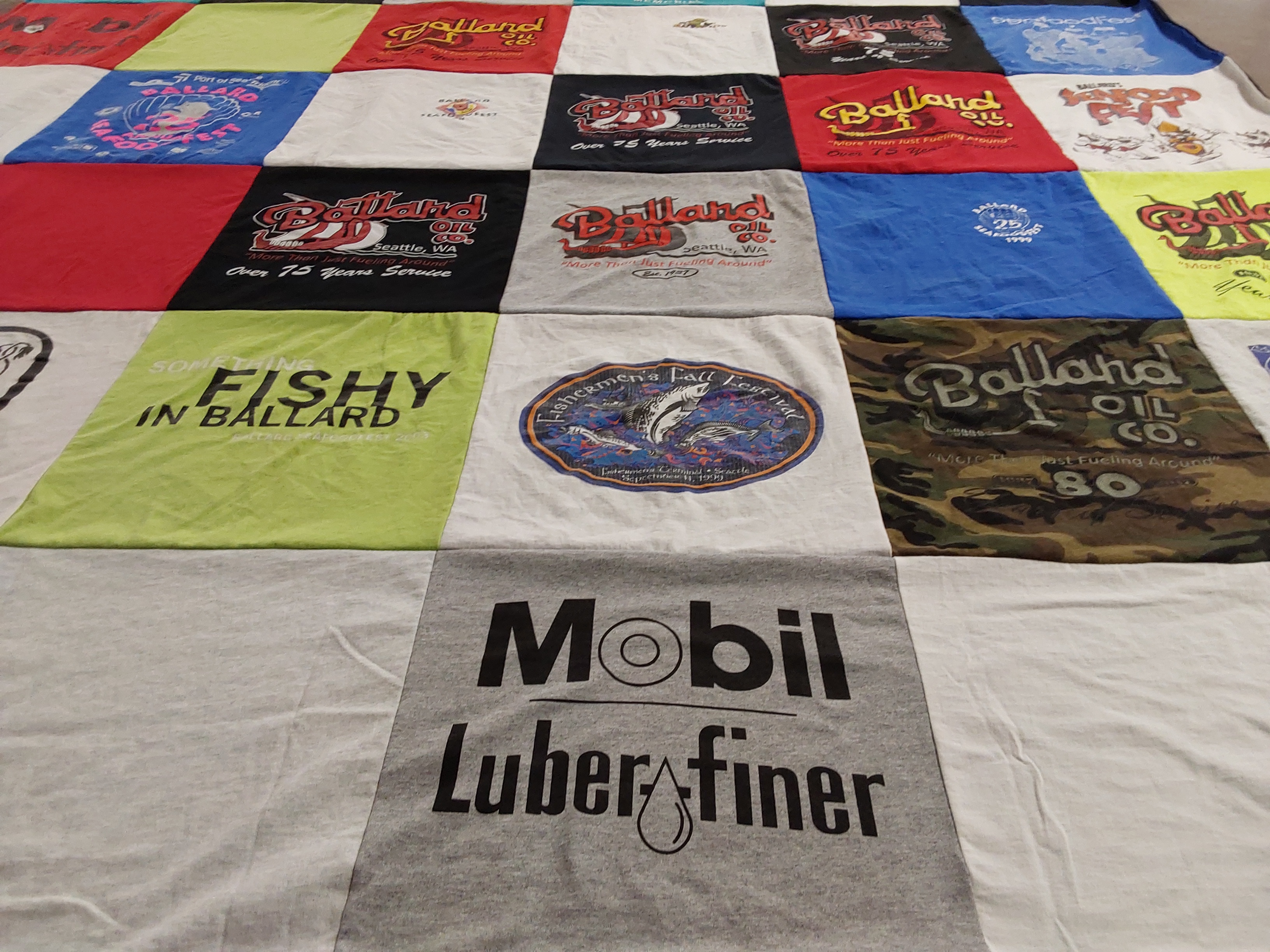 T-shirt quilt with fishing, oil themes by Donald from WA