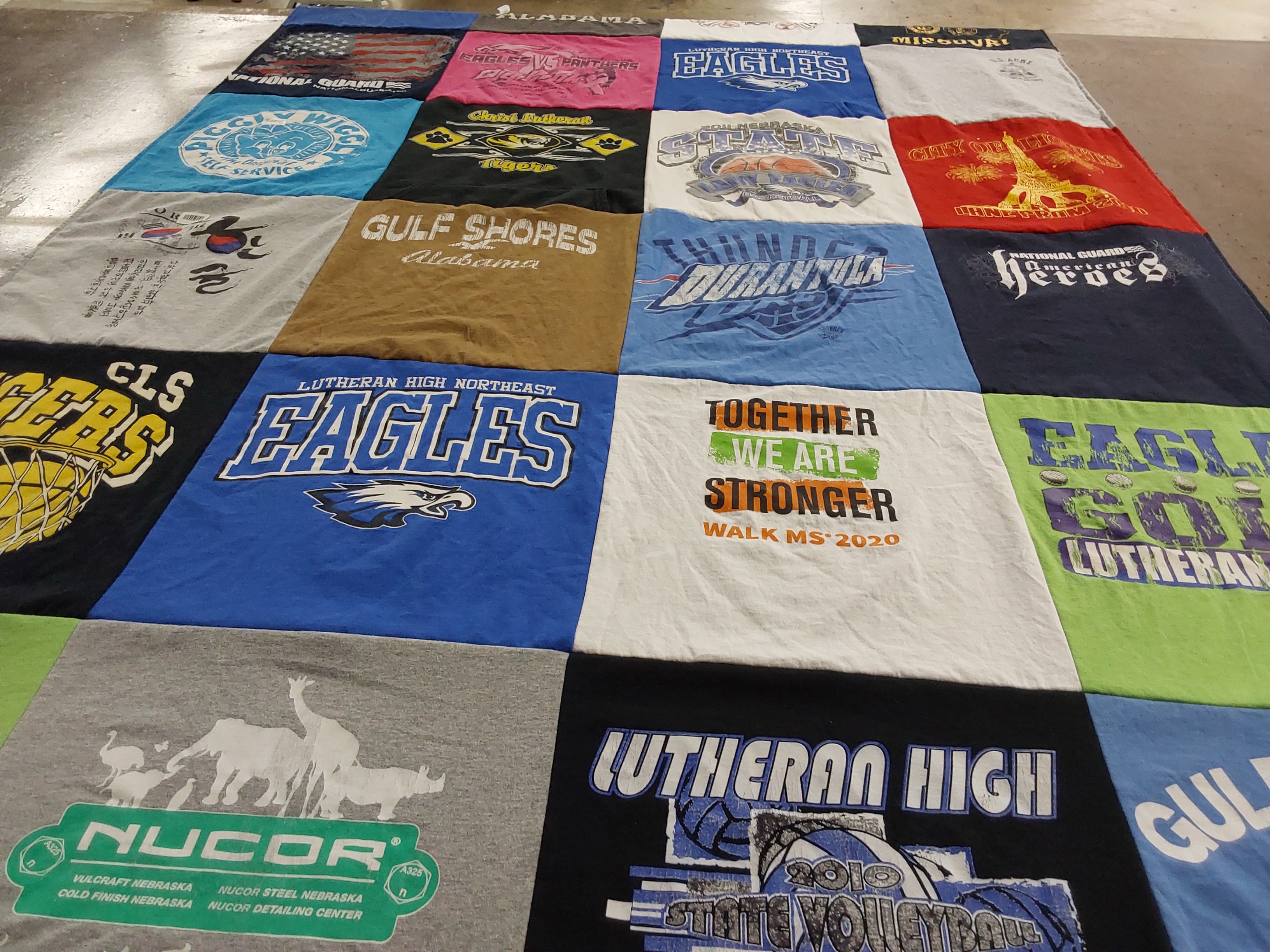 T-shirt quilt featuring cls tigers, lutheran high eagles by Cori from NE