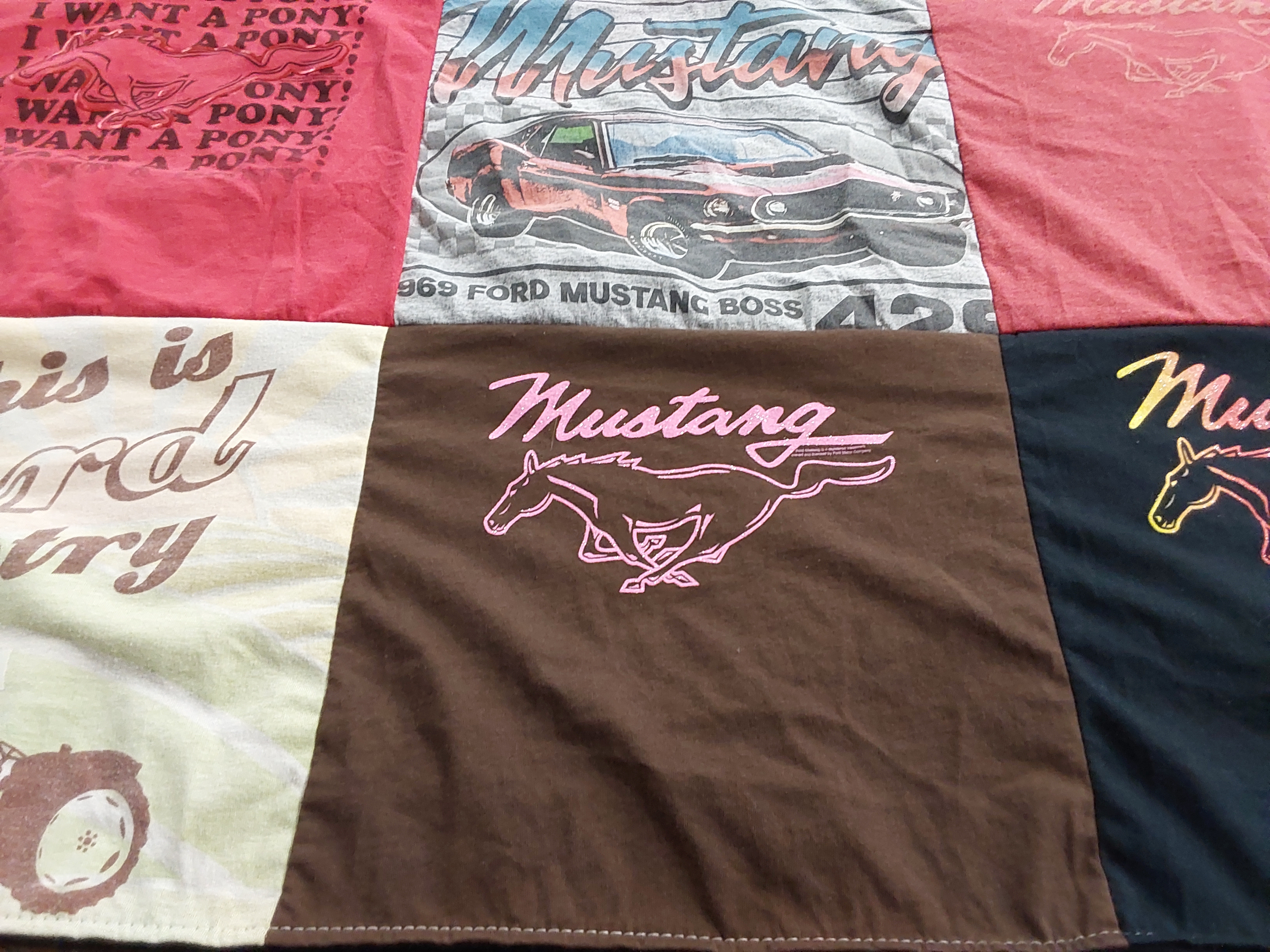 T-shirt quilt with cars, ford mustang themes by Anita from WI
