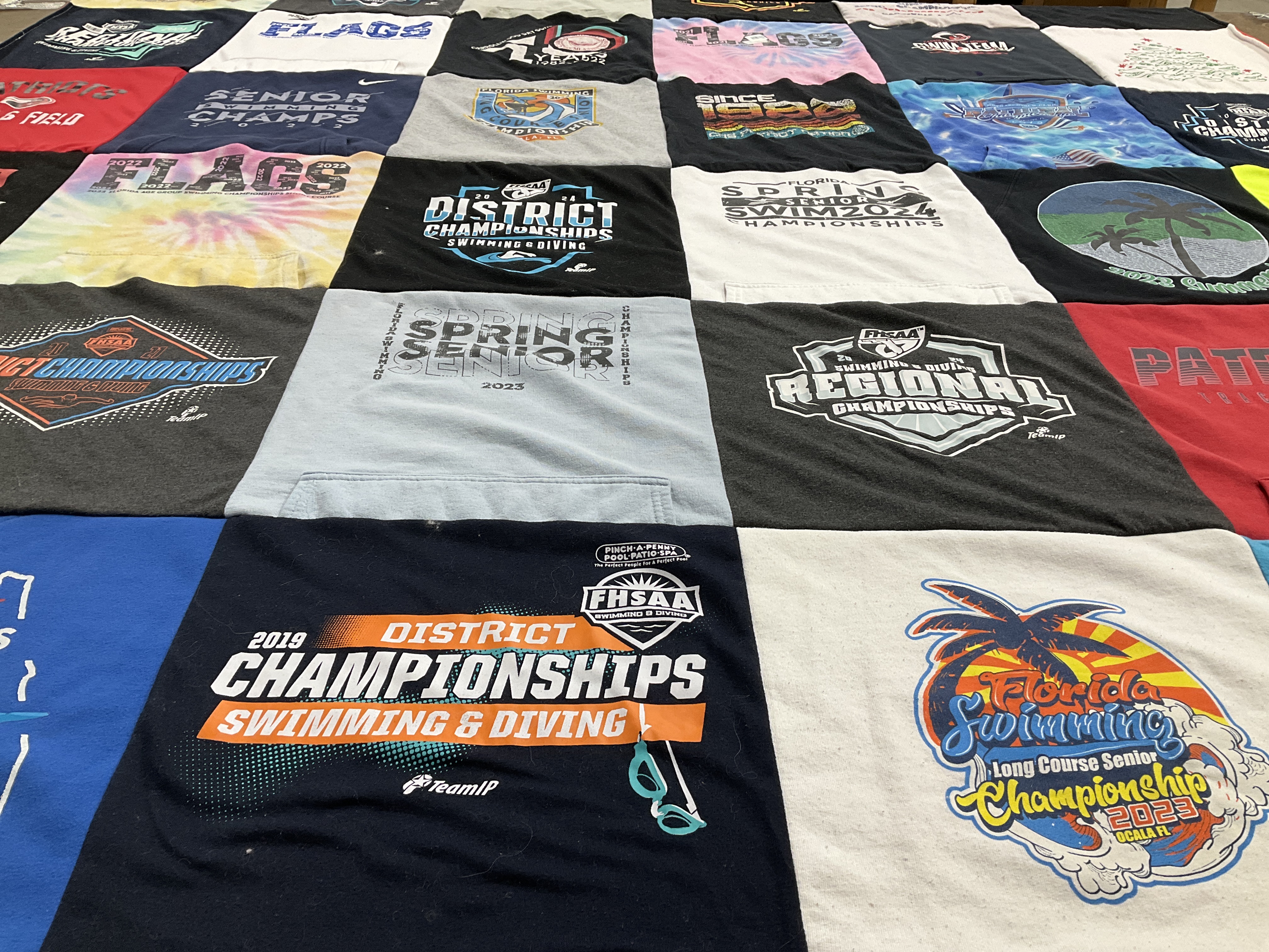 T-shirt quilt with mountain biking, racing themes by Brittany from CA