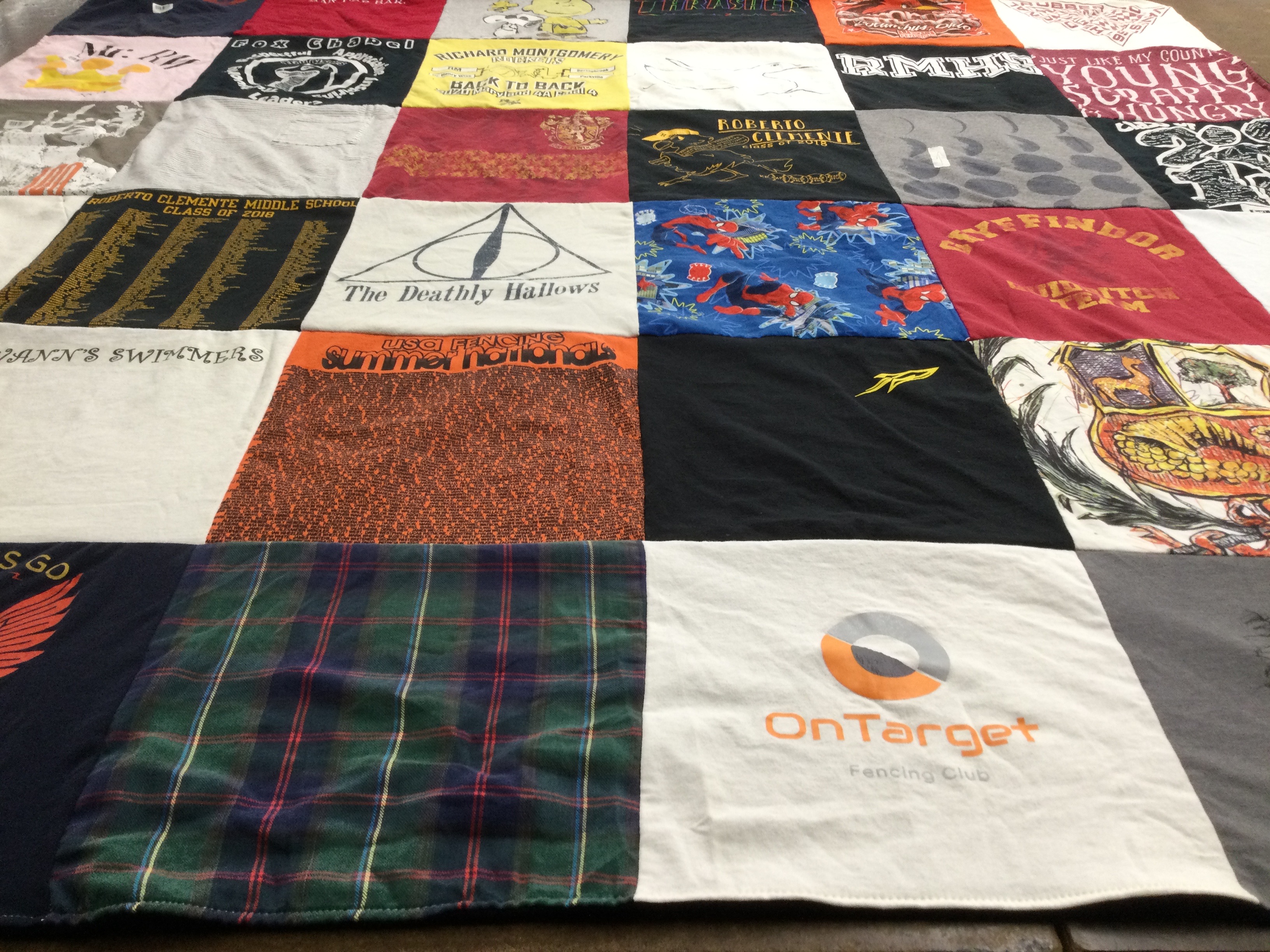 T-shirt quilt featuring gryffindor school team by Emily from MD