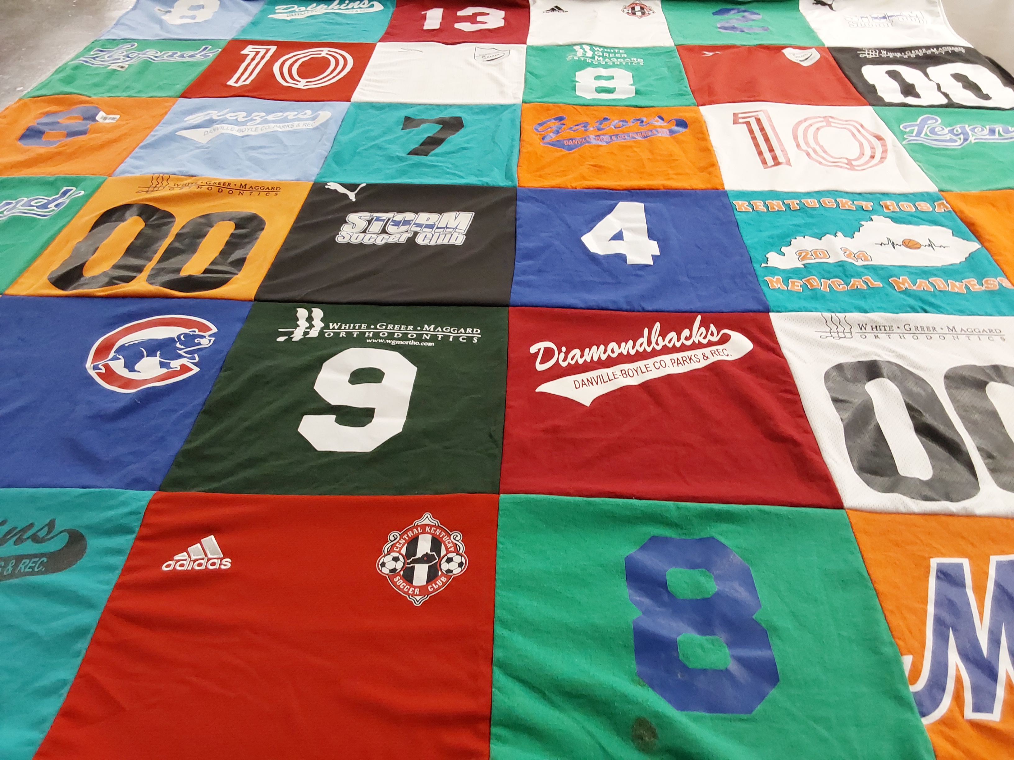 T-shirt quilt with sports, soccer themes by Lauren from KY